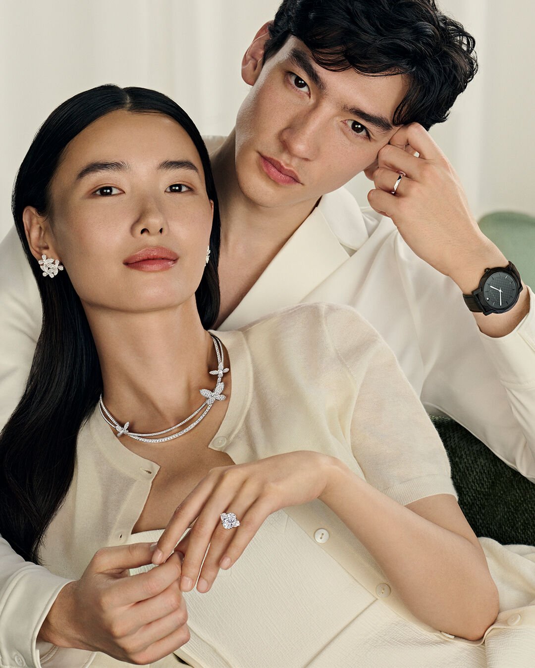 Image shows model wearing Laurence Graff Signature bangles and rings 