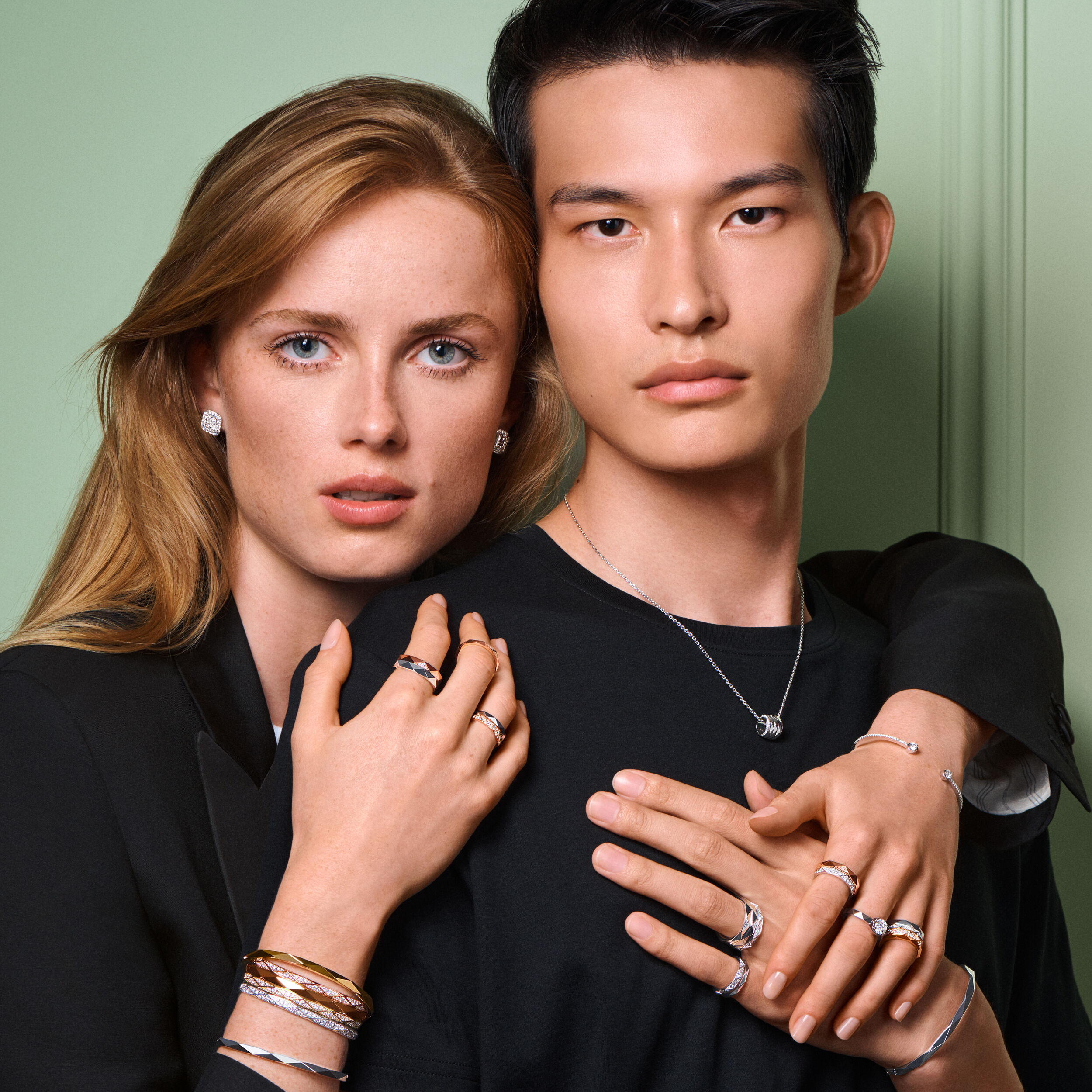 Image of female and male model wearing Laurence Graff Signature collection jewellery