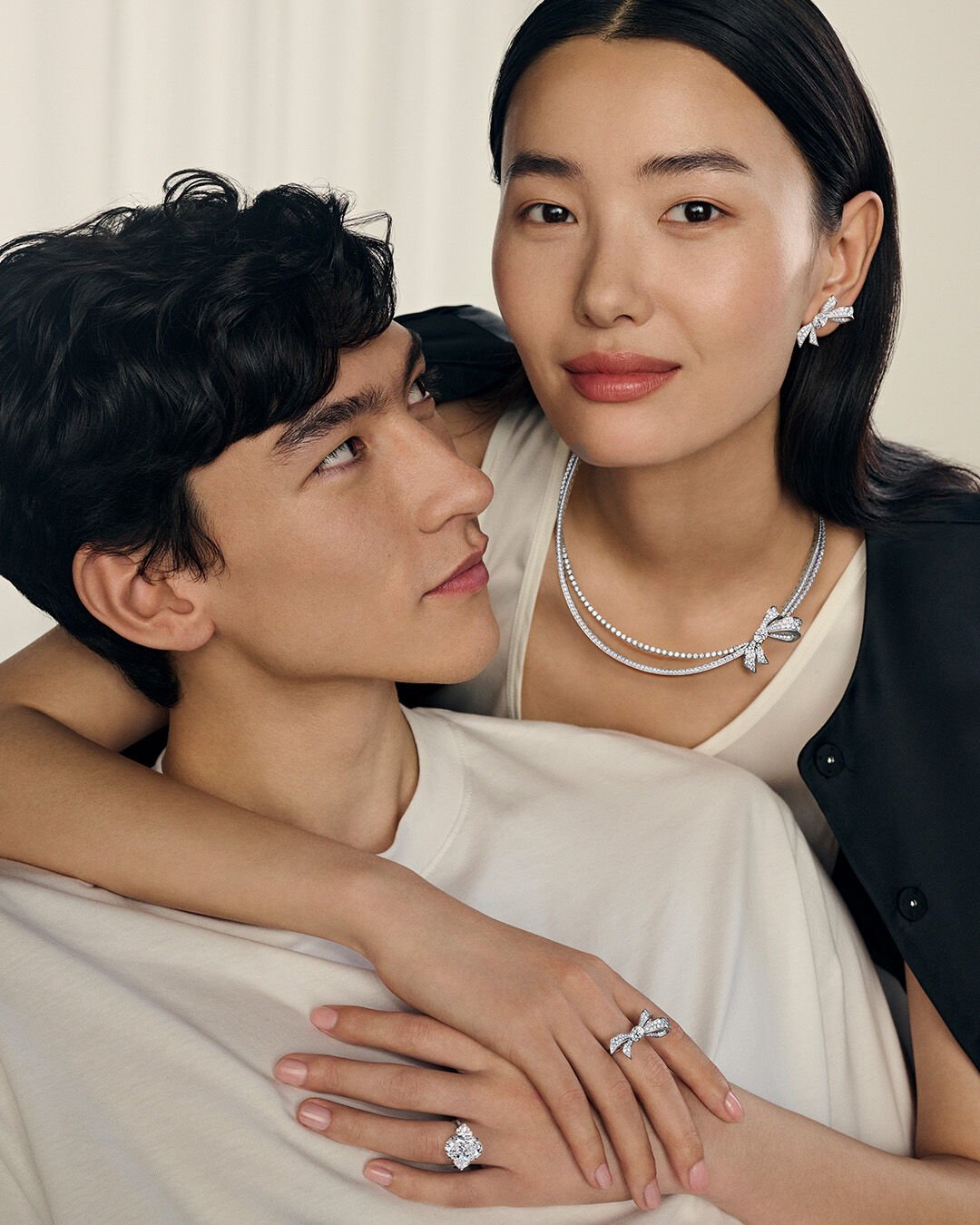 Valentine's Day - image shows model wearing heart shape diamond engagement ring, line bracelet and necklace