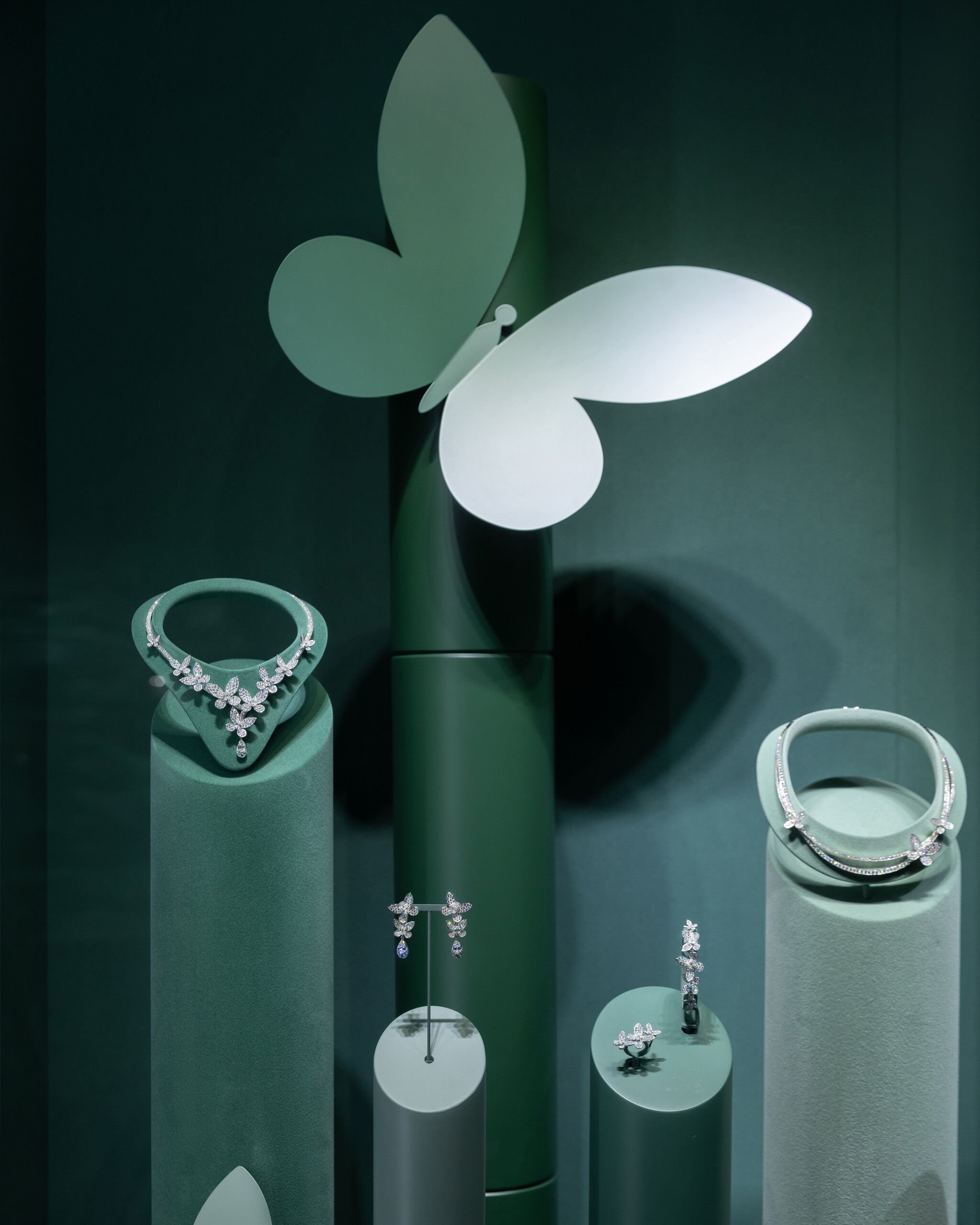 Image of model wearing Graff Butterfly diamond jewellery