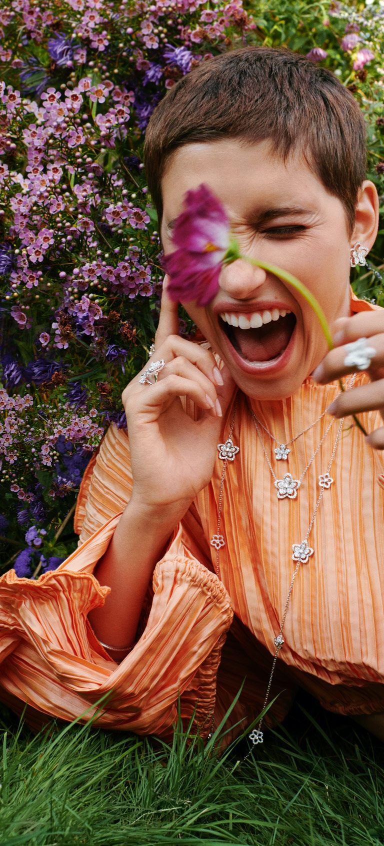 Image of model wearing Graff Wild Flower collection jewellery