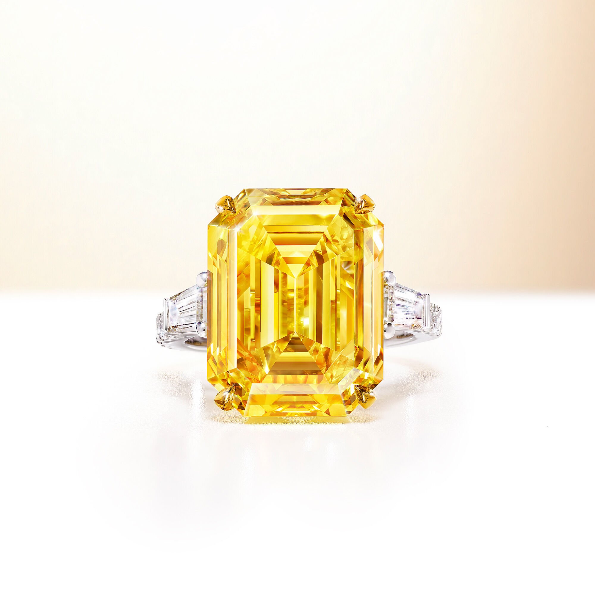 A 15.47 fancy vivid yellow emerald cut Graff diamond ring
