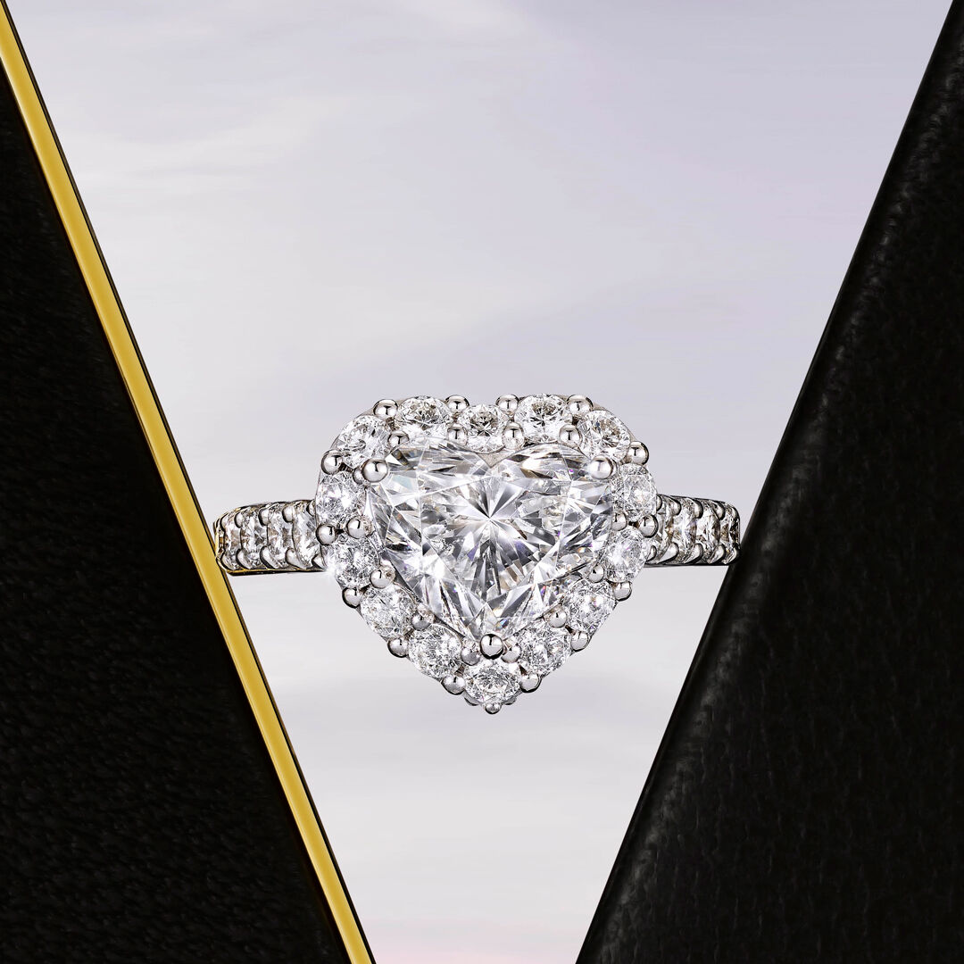 Image of a heart shape white diamond engagement ring.