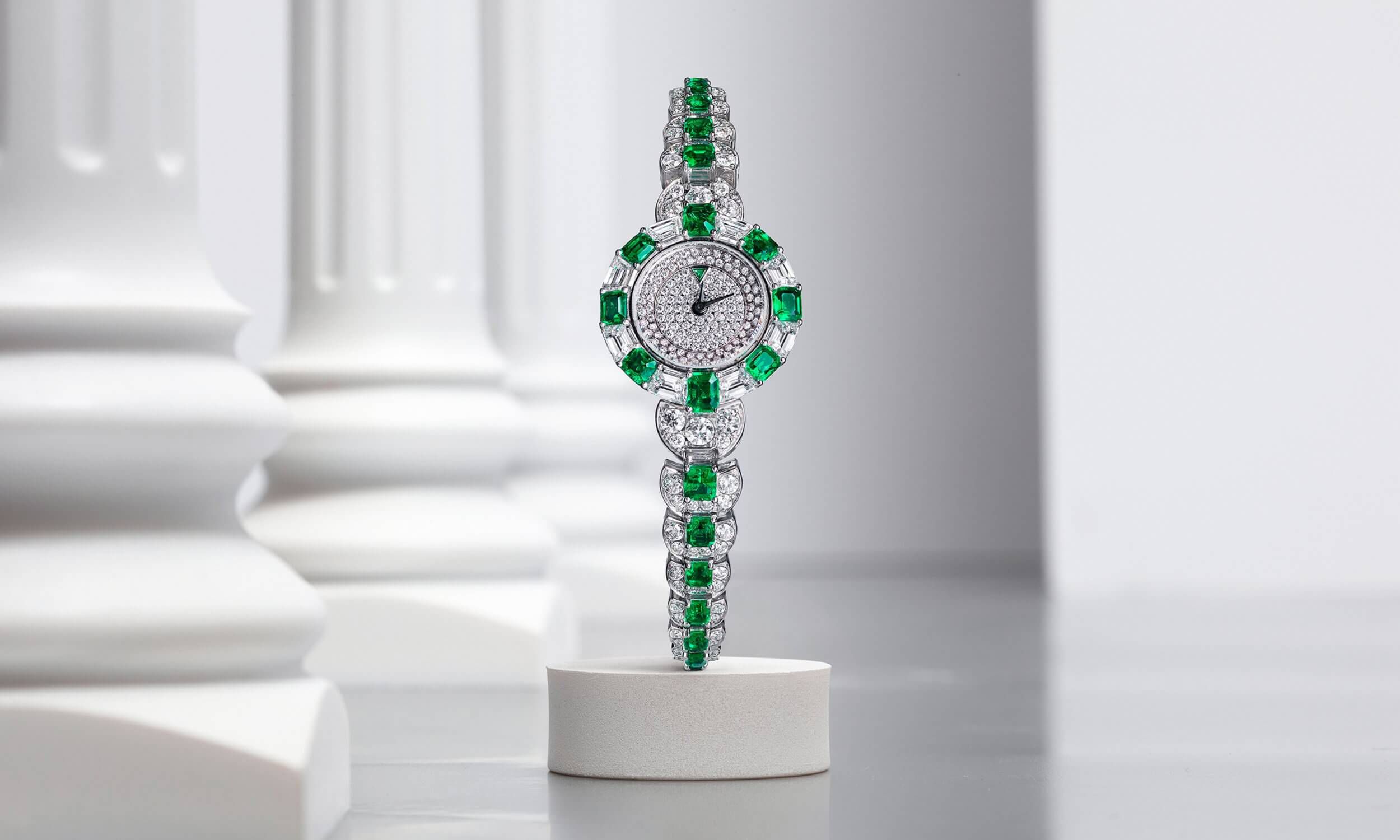 Graff Mini Deco Watch, Emerald and Diamond on a Multi-shape Emerald and Diamond Bracelet inside a Gallery