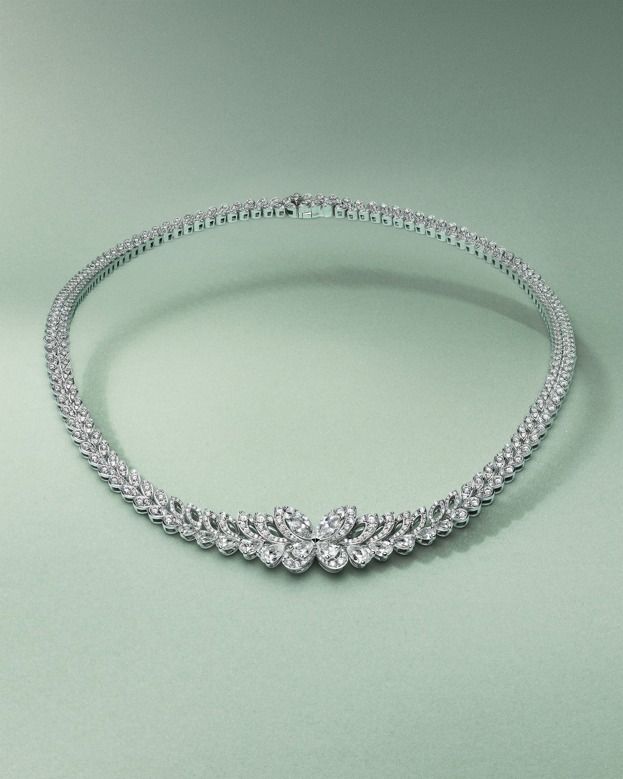 White diamond Jewellery - image shows model wearing Graff Tilda's Bow collection and solitaire ring