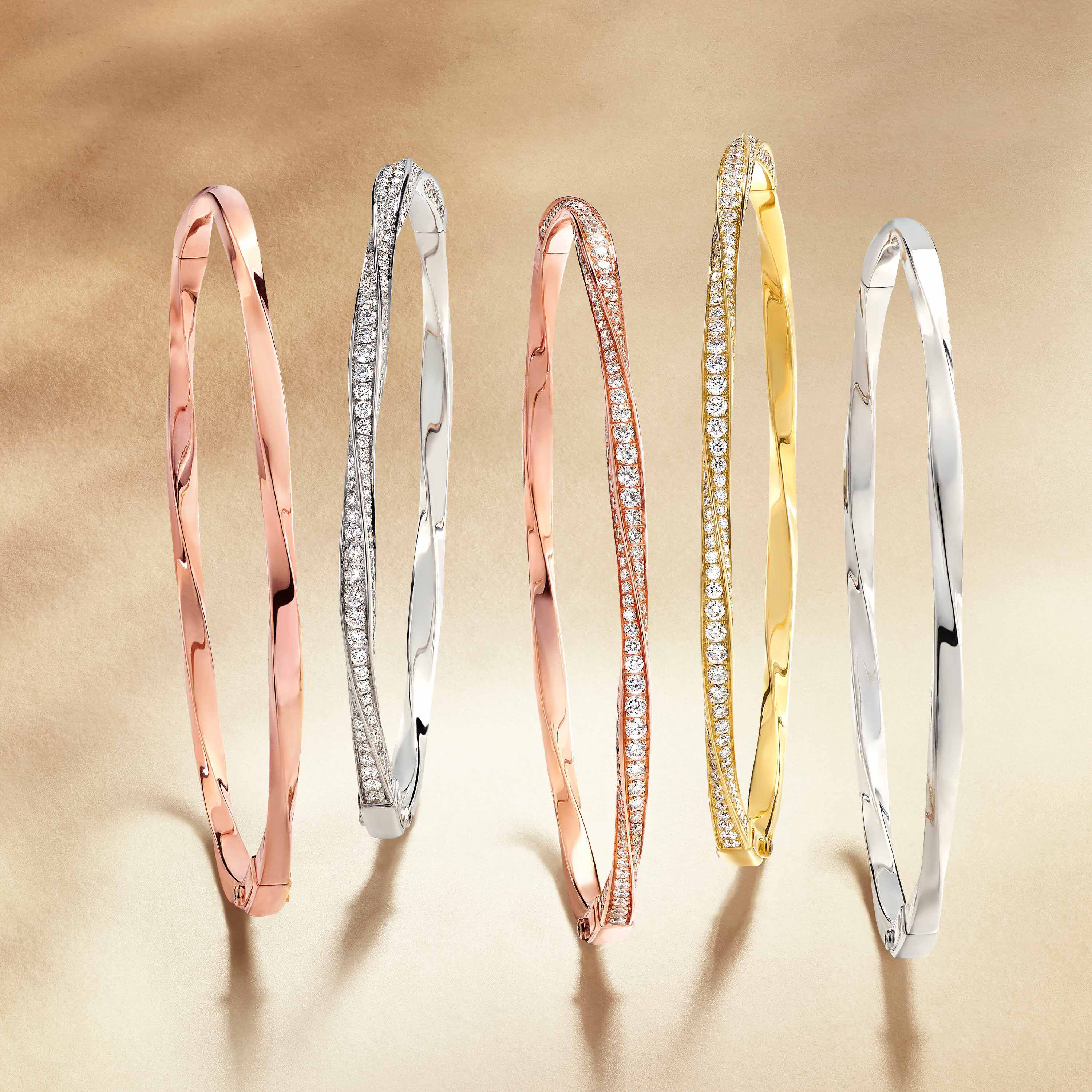 Graff Spiral jewellery collection band set in rose and white gold