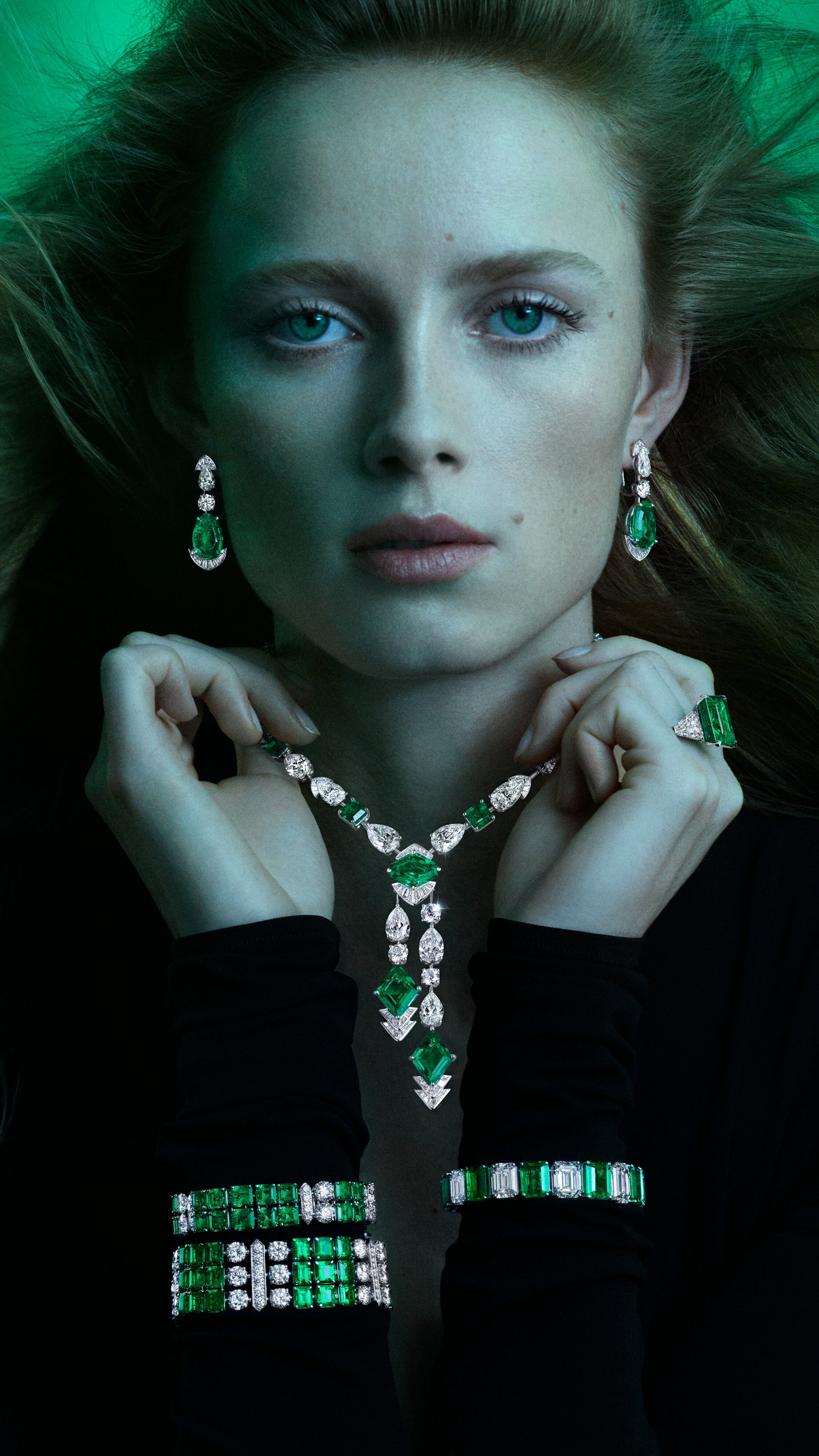 Model wears emerald high jewellery