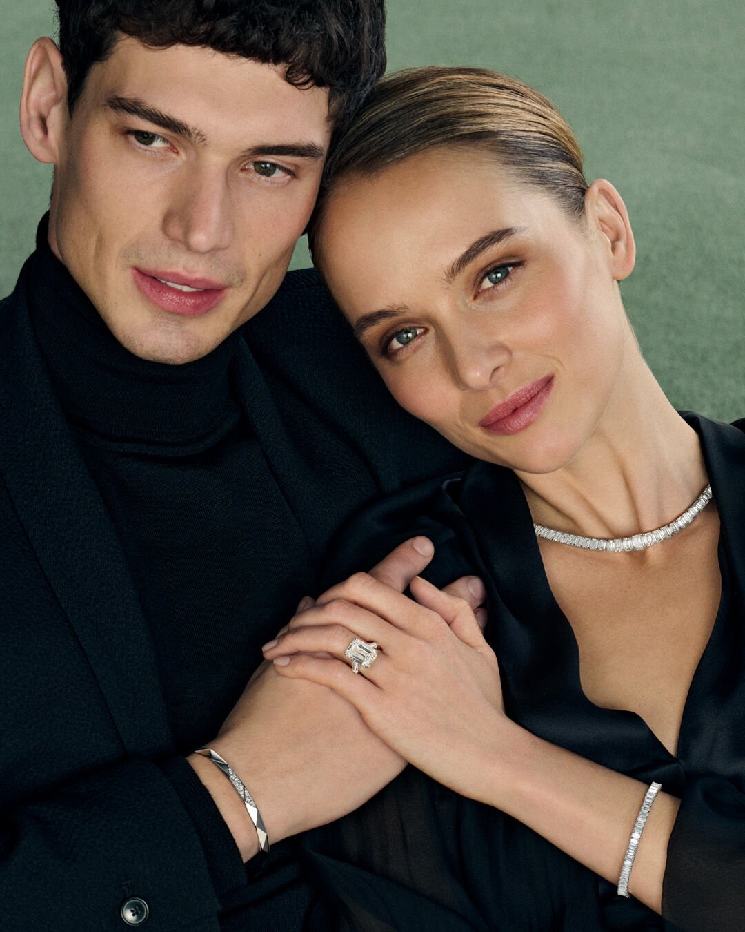 Image shows model wearing heart shape diamond engagement ring