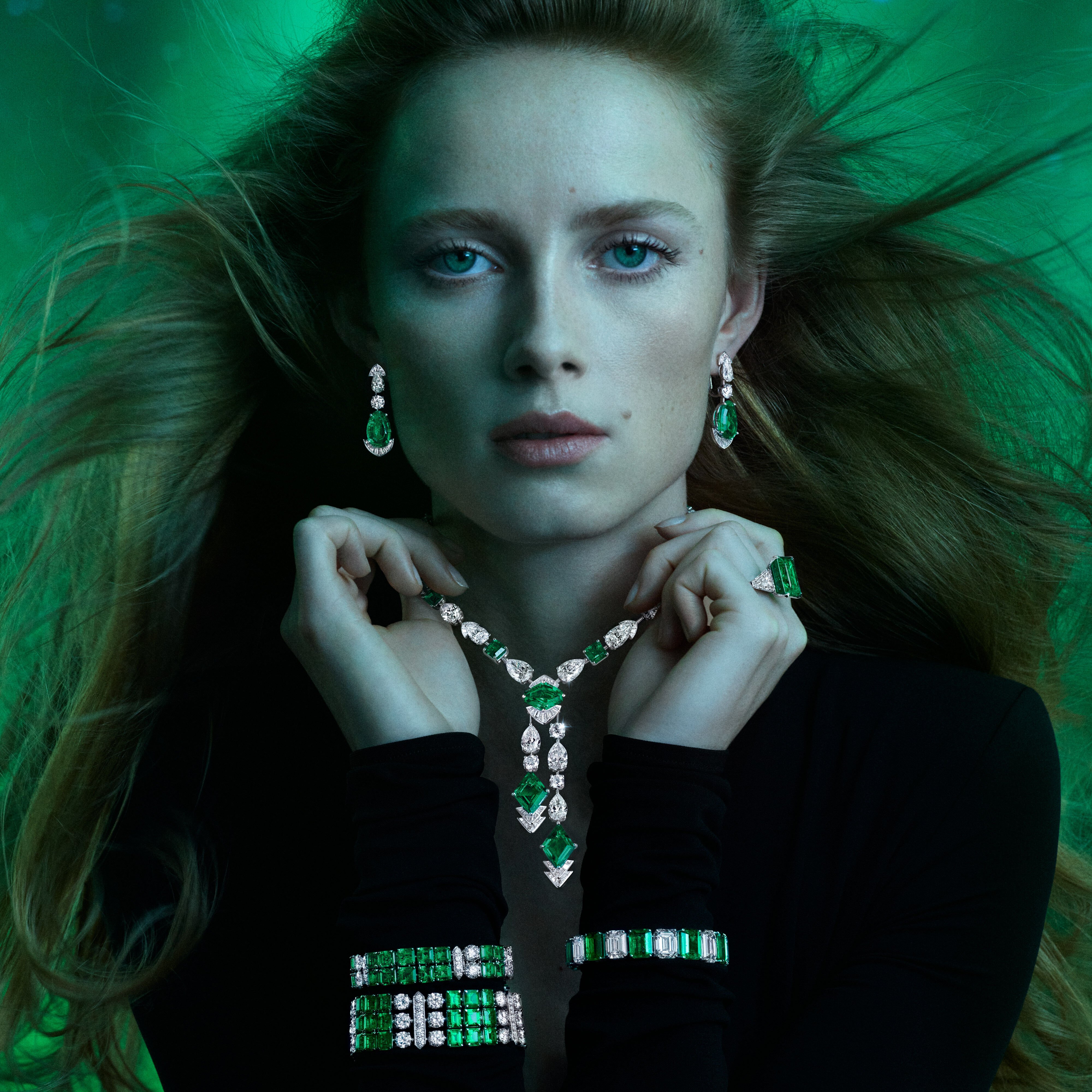 Image of model wearing Graff Galaxia Emerald High Jewellery Suite 
