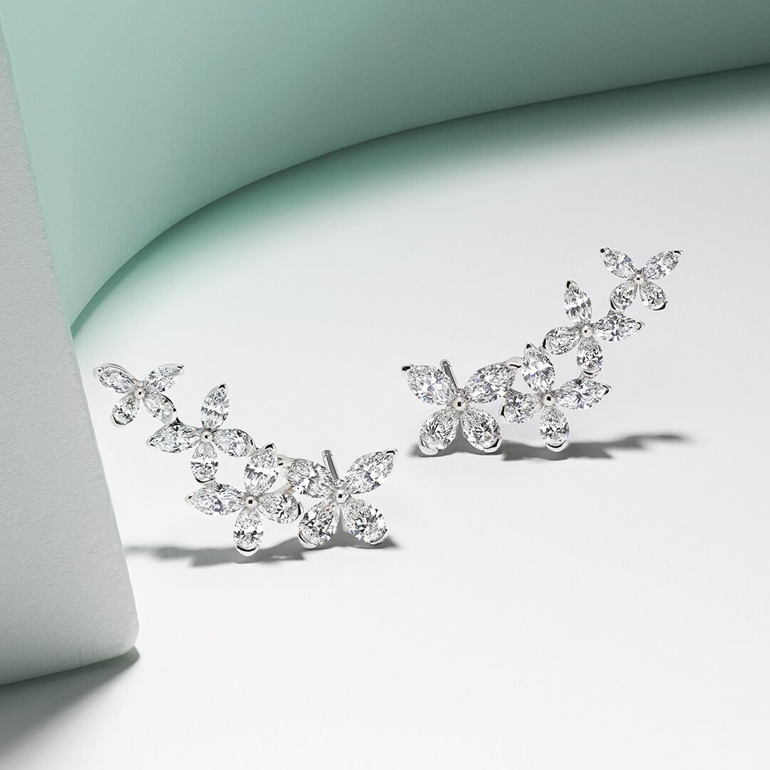 Image shows Graff Butterfly Ear climber stud earrings