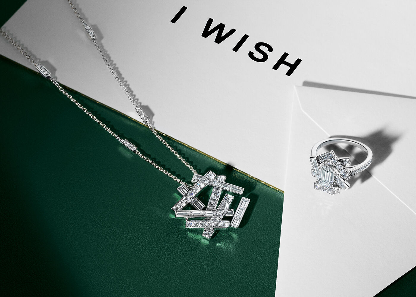 Gifts for her - Still life image of Graff Tilda's Bow earrings and pendant 