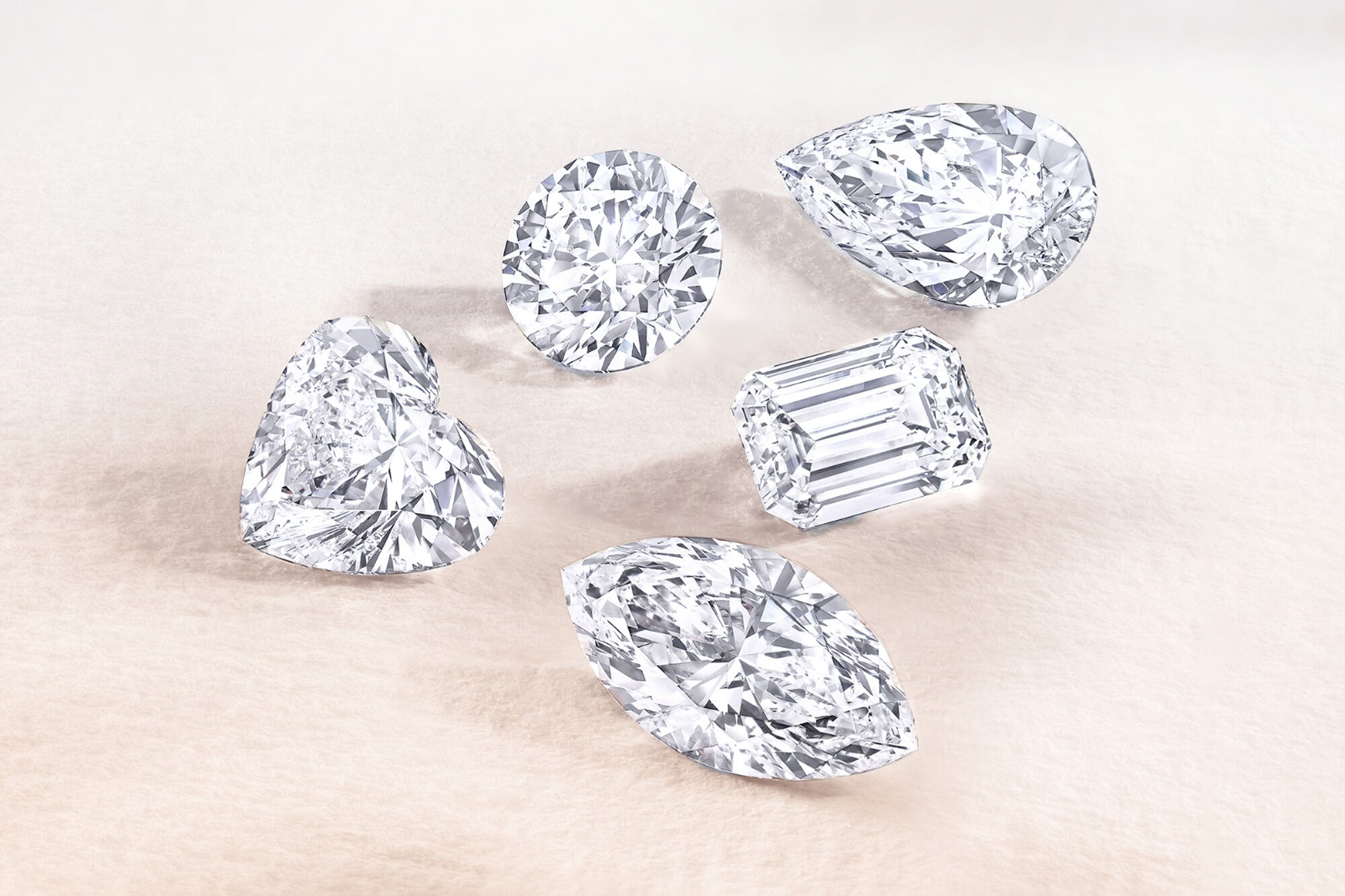 Close up of five white diamonds by Graff