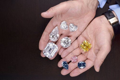Close up of famous diamonds in the hands of Mr Laurence Graff