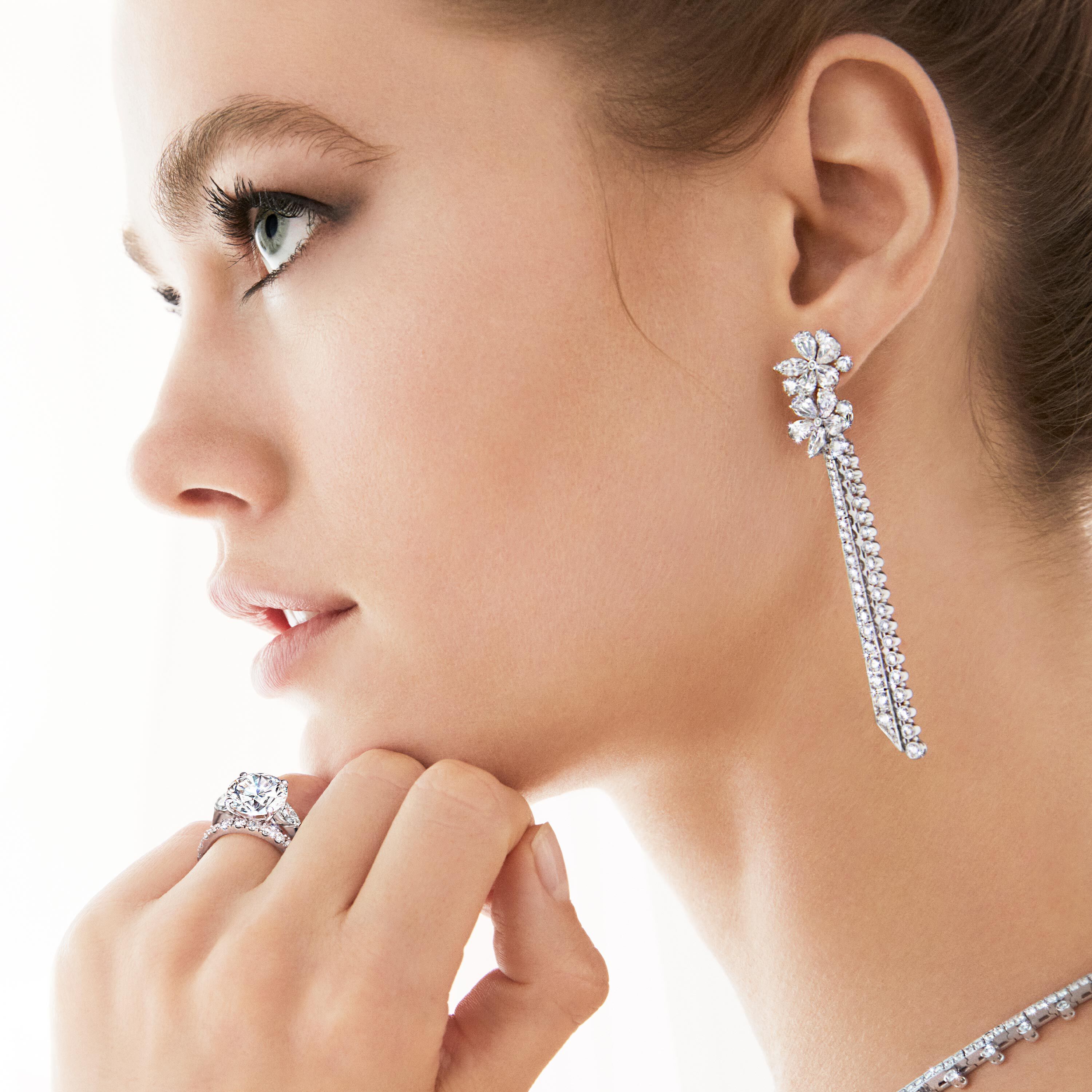 Close up of model wearing Graff bridal diamond jewellery