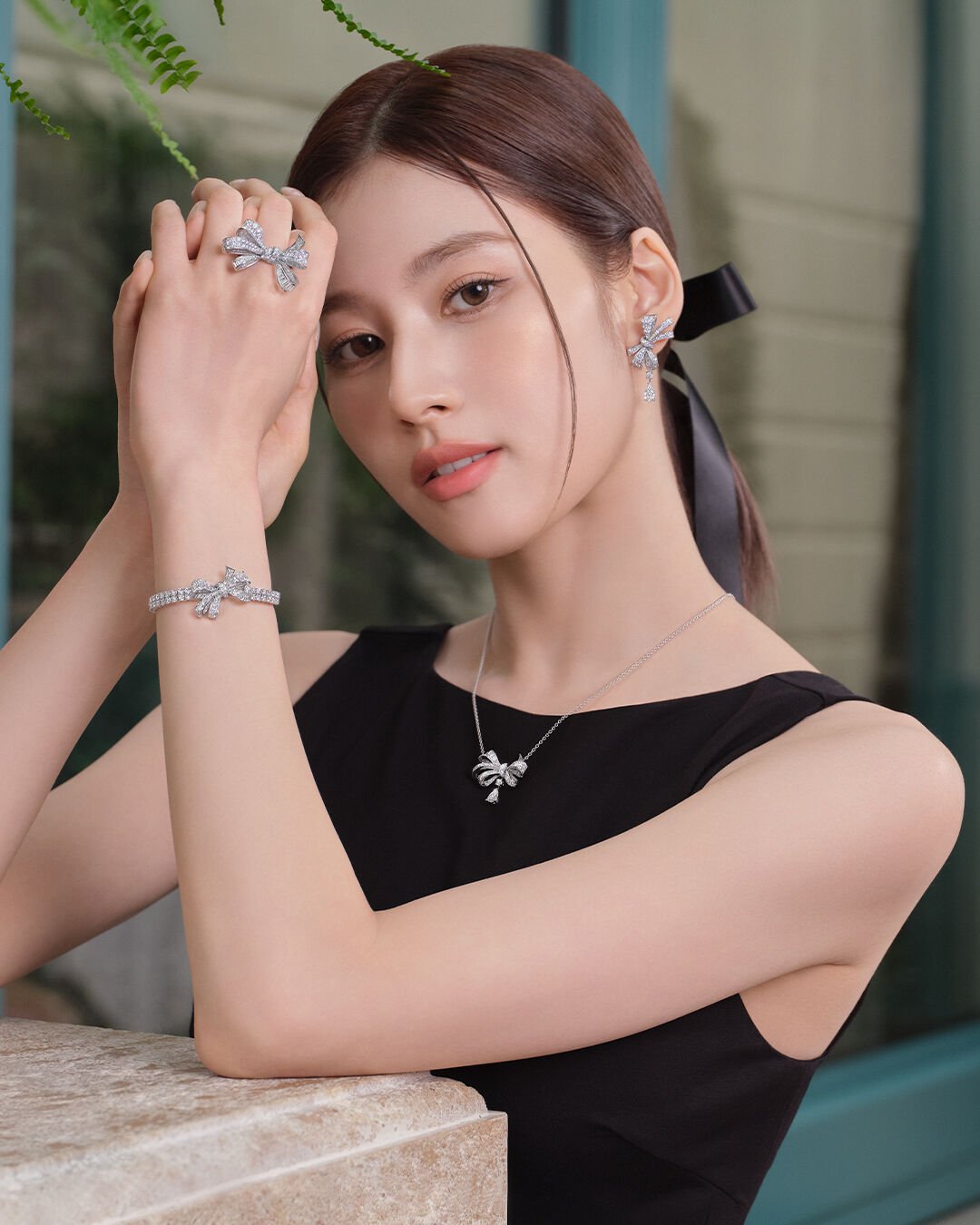 Image of Graff Brand Ambassador TWICE Sana wearing Graff Butterfly jewellery