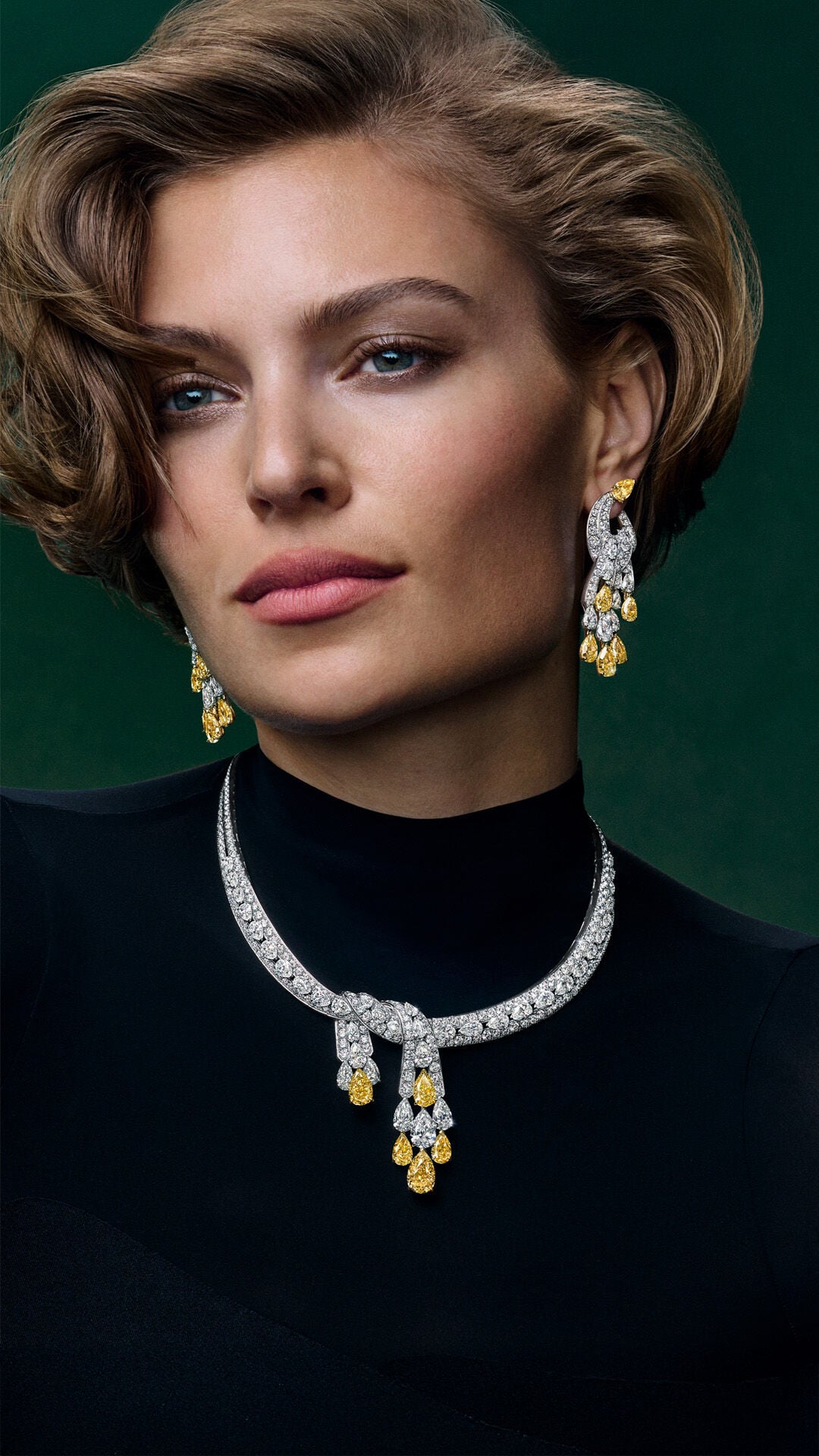 Image shows Graff brand ambassador Jung Kook wearing Laurence Graff Signature collection jewellery
