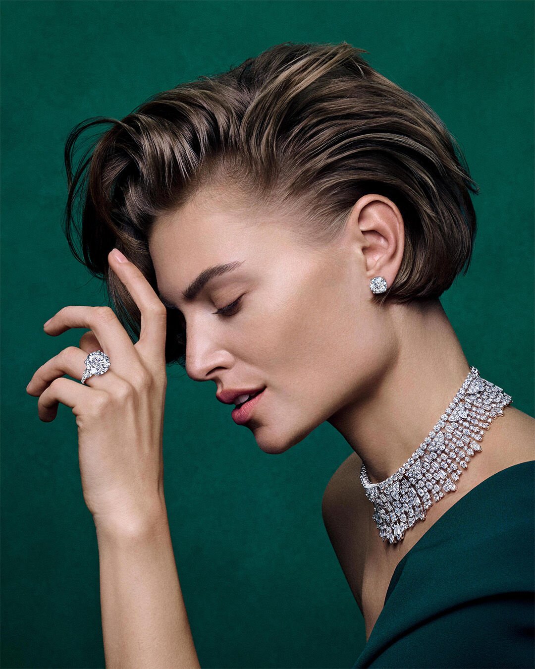 Image shows model wearing Graff White Diamond High Jewellery suite