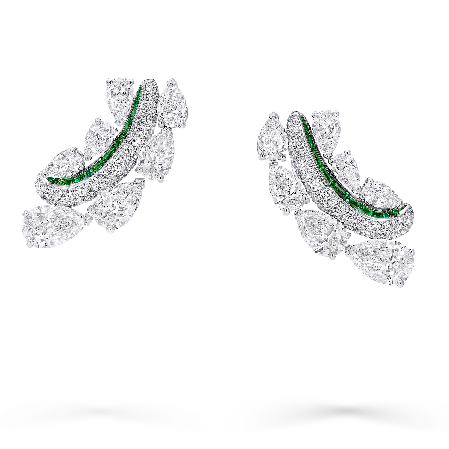 Image of Graff Emerald and White Diamond Solitaire ring being assembled in Graff workshop