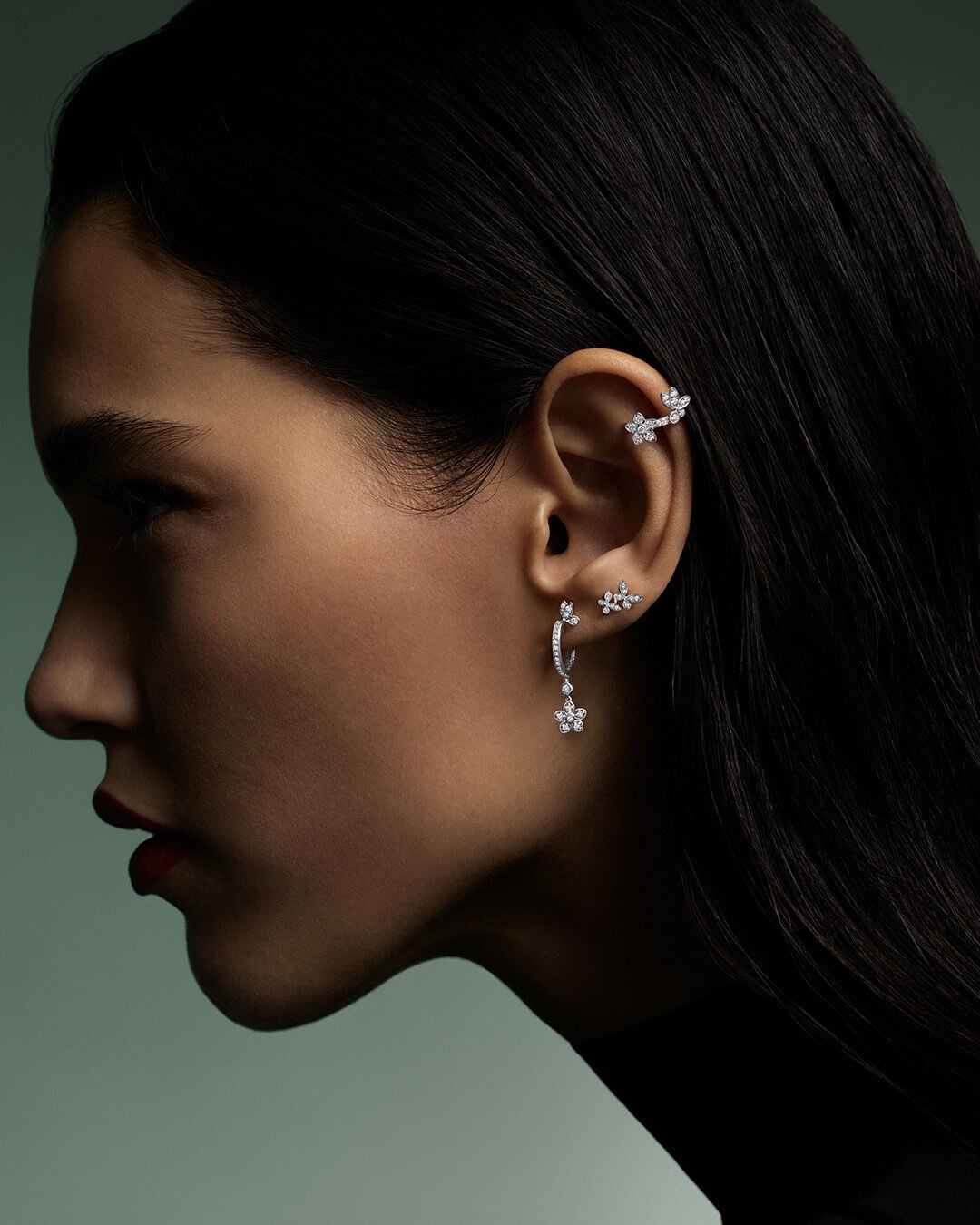 Image shows model wearing Graff Butterfly Earrings and Ear Cuff
