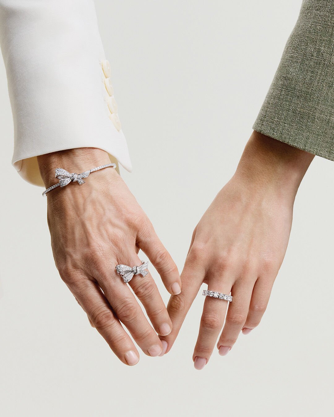 Image shows models wearing Graff Tilda's Bow diamond jewellery