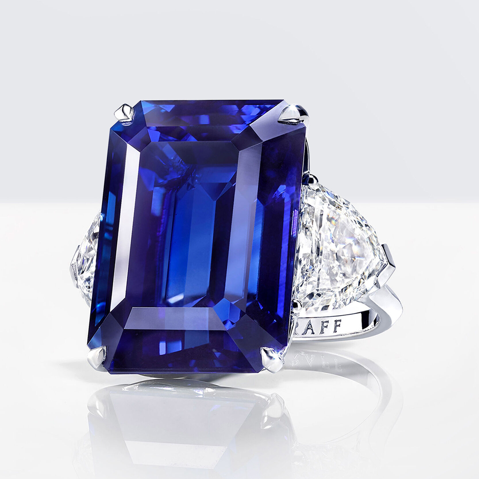 An emerald cut sapphire and white diamond ring by Graff
