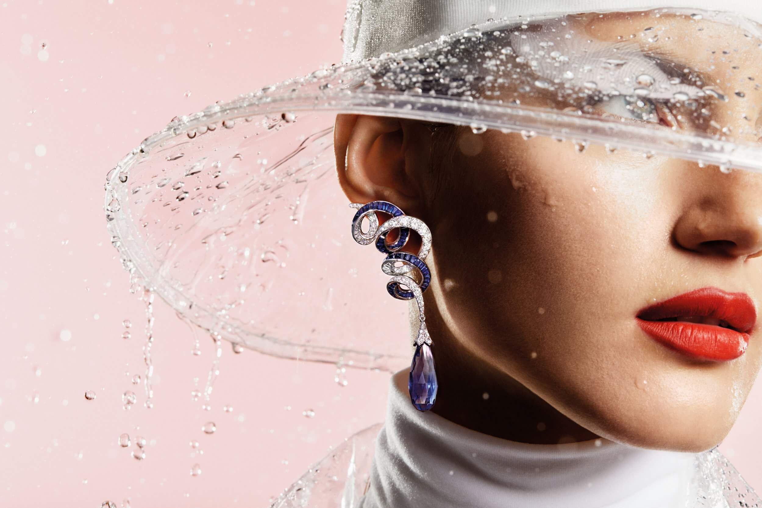 Close up of a model wearing Graff Inspired by Twombly Collection Sapphire and Diamond Earrings