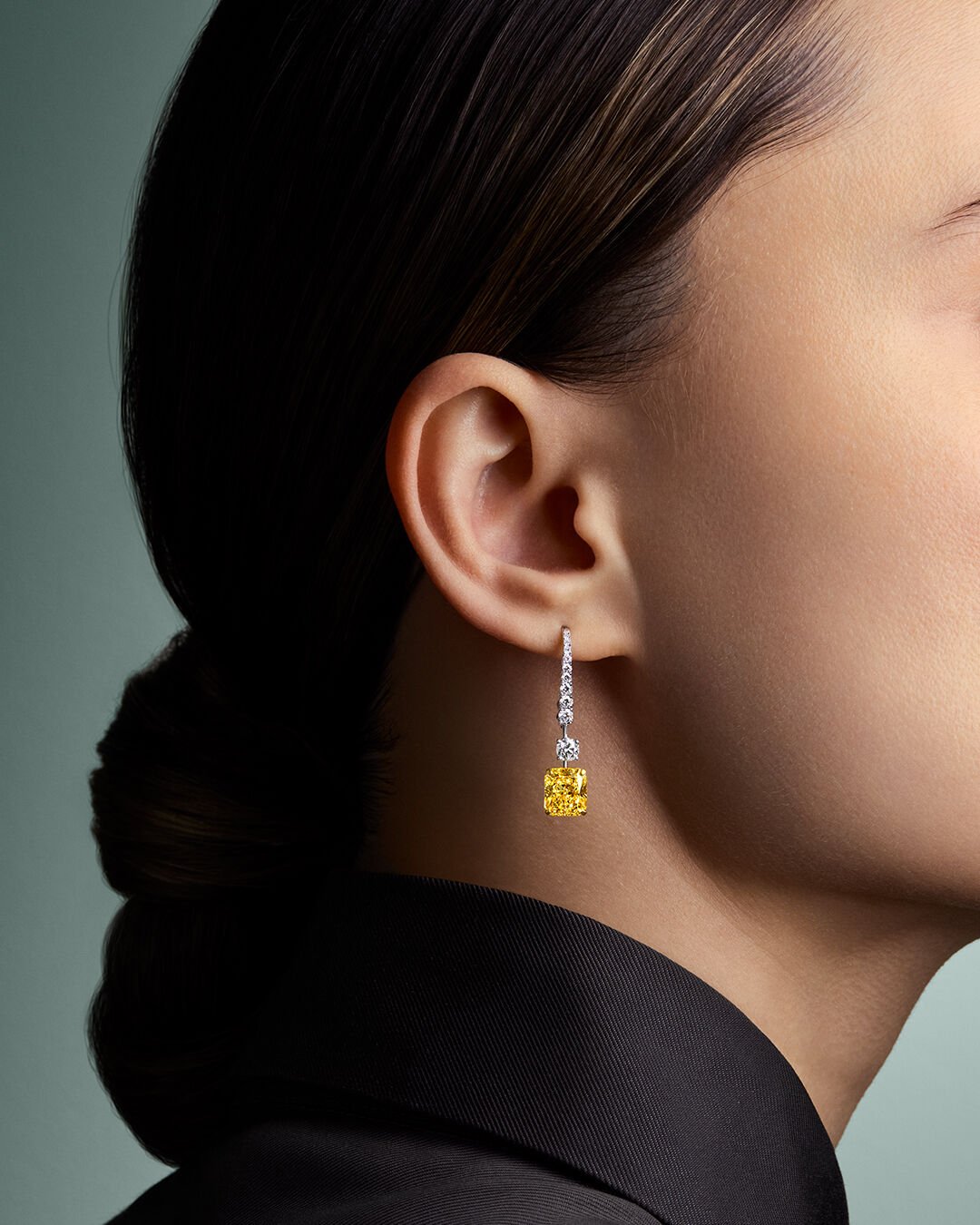 Model wears Tilda's Bow diamond drop earrings 