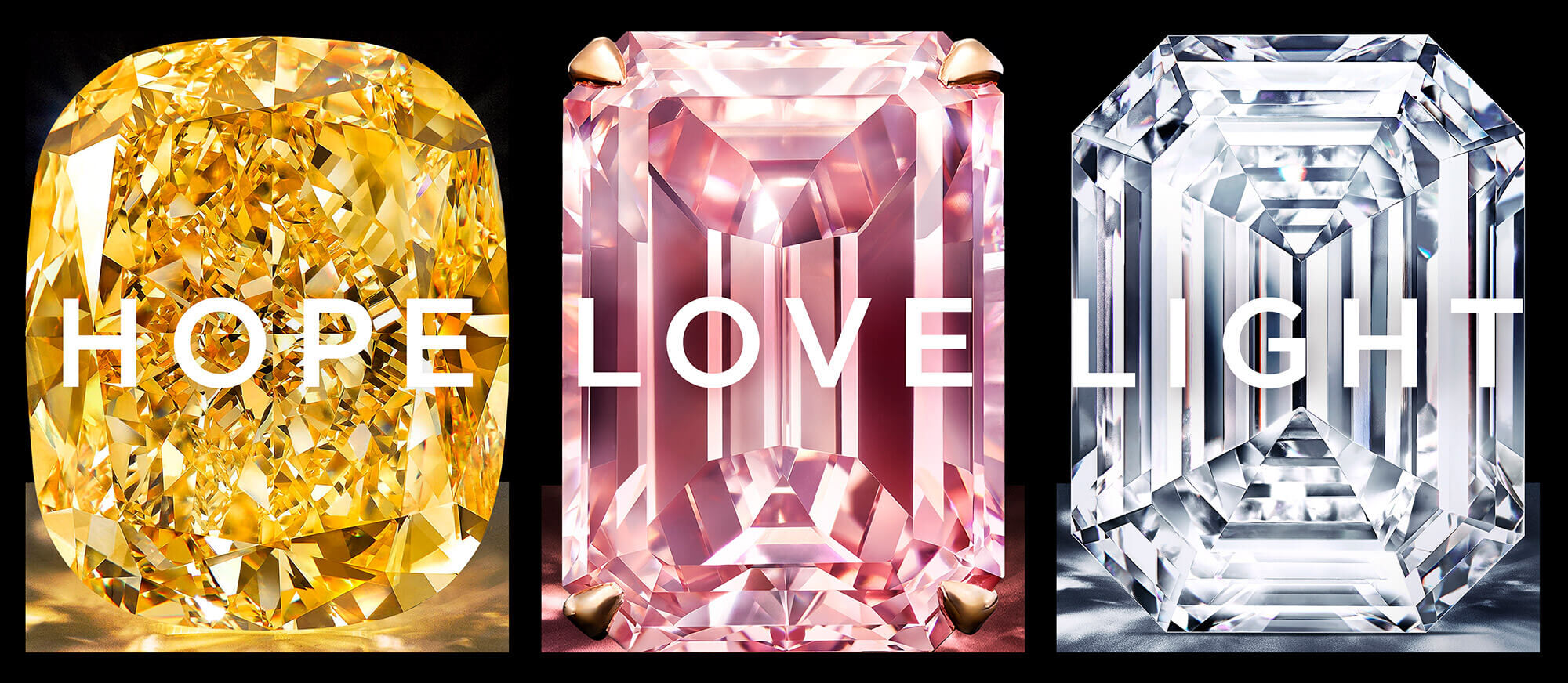Three diamonds with with writing. Yellow diamond with Hope, Pink diamond with Love and White diamond with Light