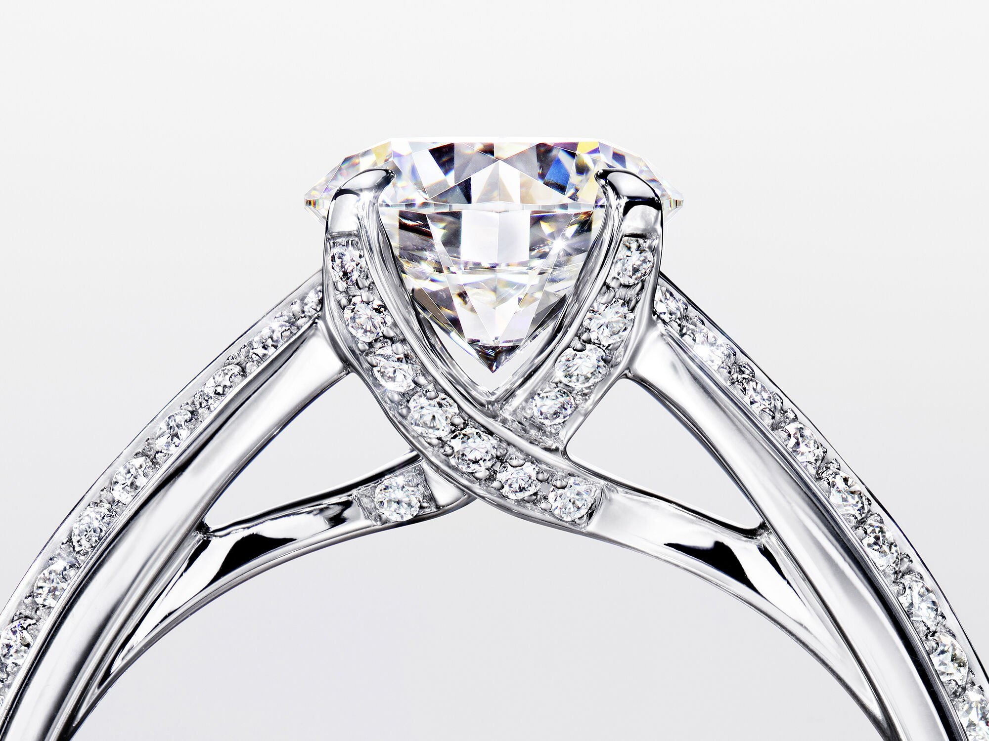 A side view of a Graff Legacy setting diamond bridal engagement ring 