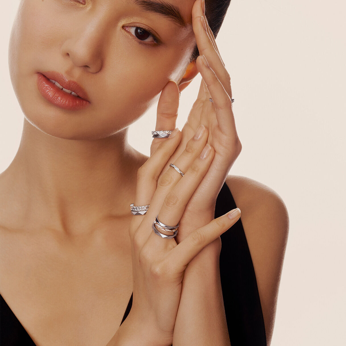 Graff Essentials, model wears a variety of plain and white diamond rings