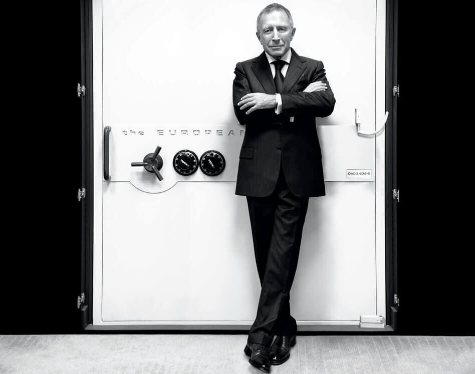 Mr Laurence Graff OBE stands in front of a jewellery vault