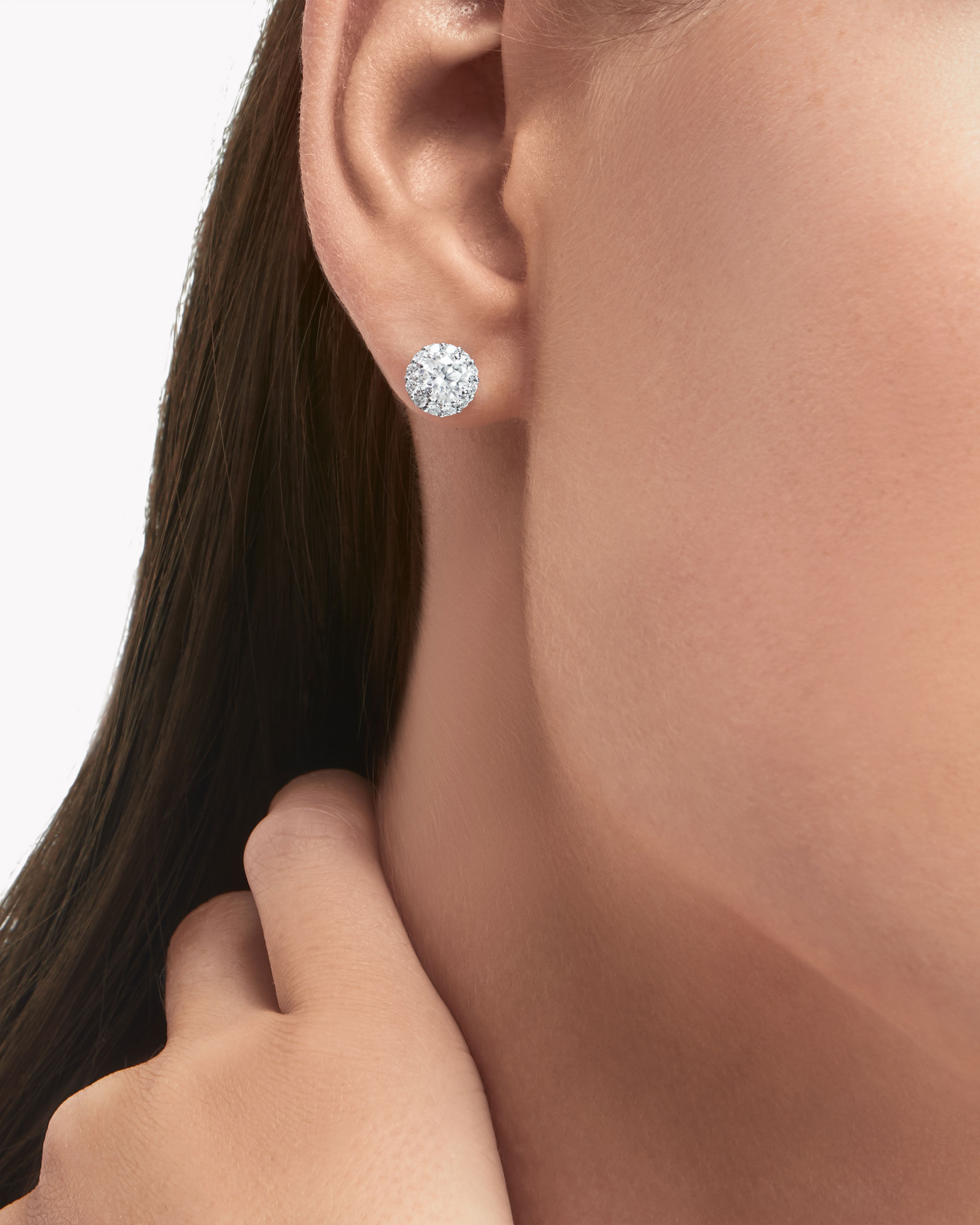 Close up of a model wears Graff jewellery collection earrings
