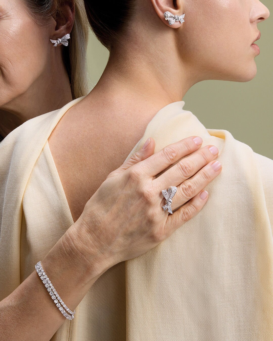 Mother's Day - image shows models wearing Graff TIlda's Bow diamond jewellery and diamond braclets 