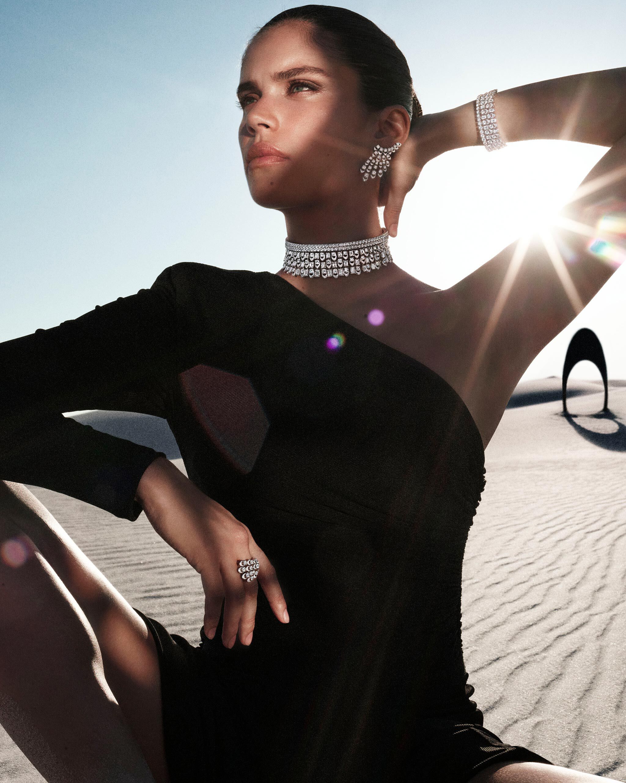 Model wears Graff Gateway diamond jewels from the Tribal collection in  a dessert.