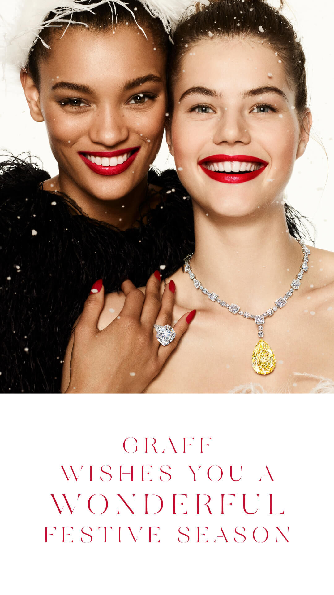 Two model wearing Graff diamond high jewellery with a 'Graff wishes you a wonderful festive season' quote