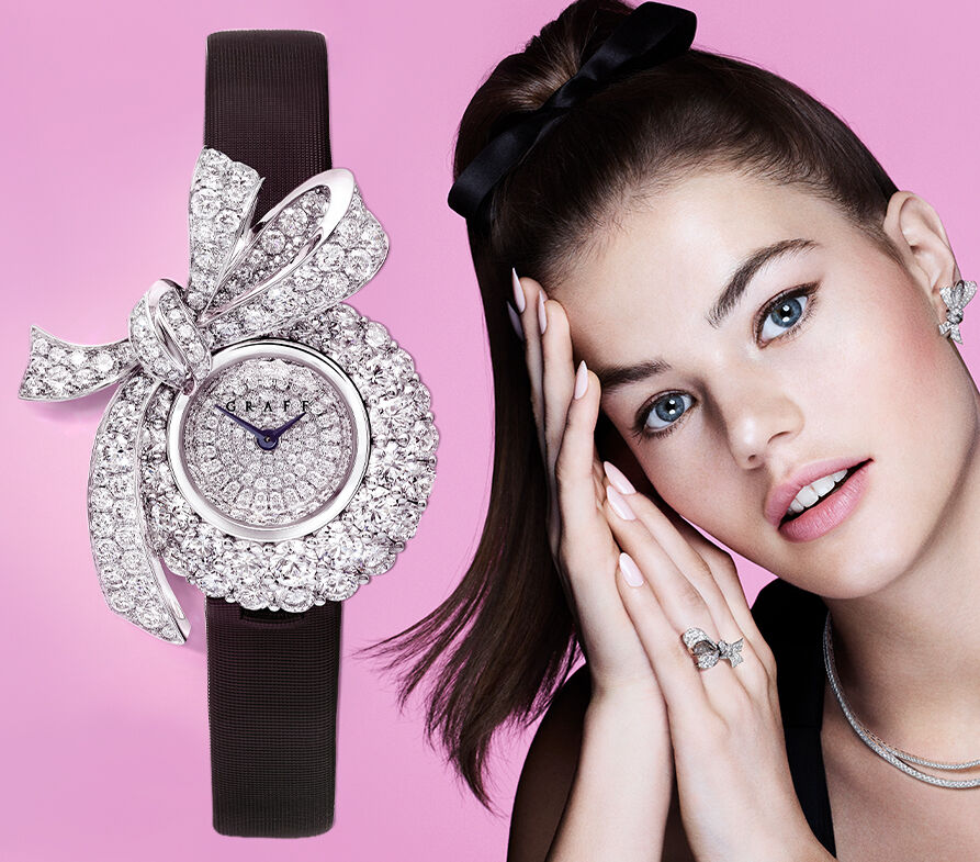 Model wears a Graff spiral collection diamond watch with white mother of pearl dial