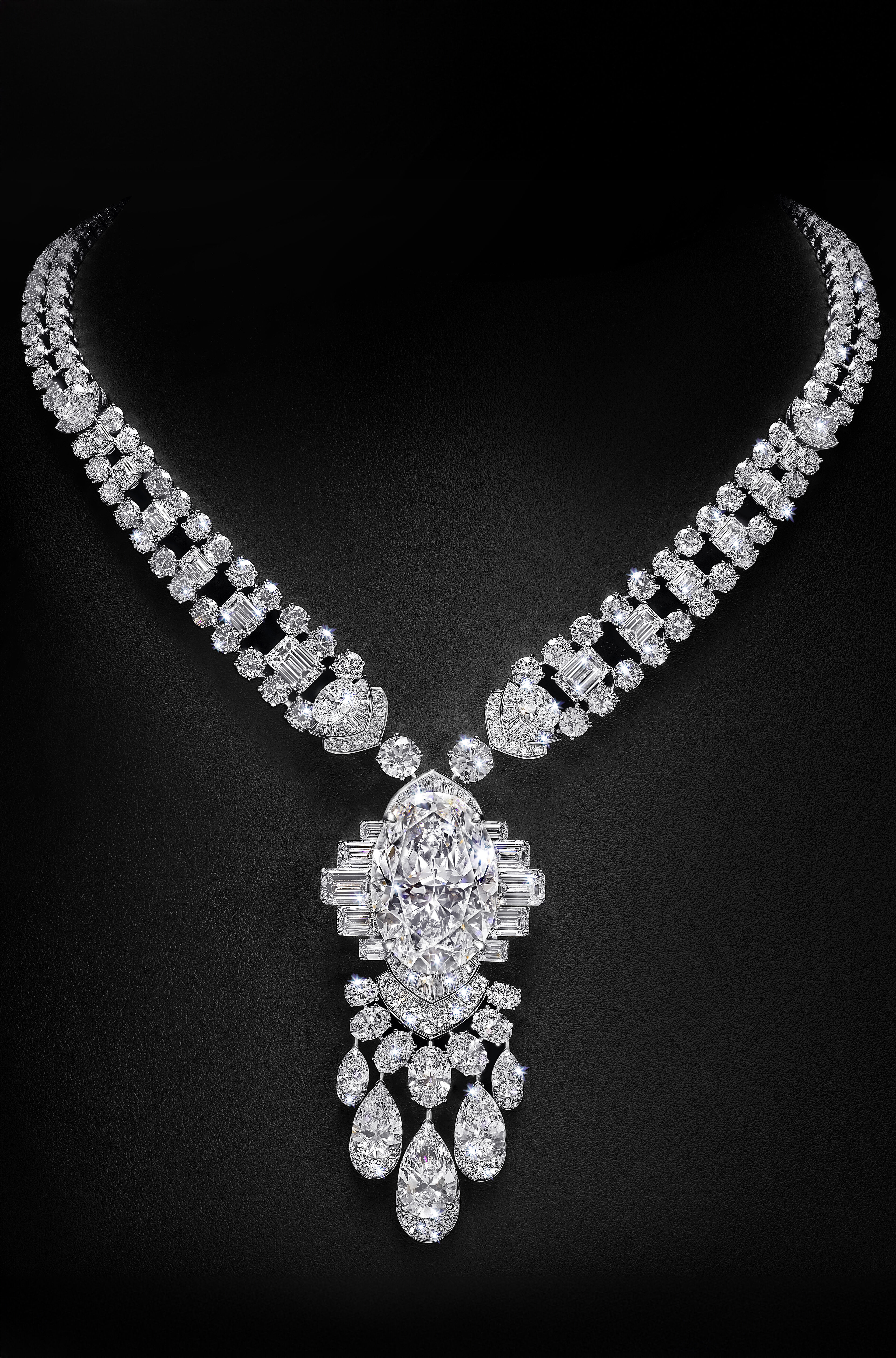 Engagement Rings - image shows Graff Emerald Cut and Round Diamond Engagement Rings