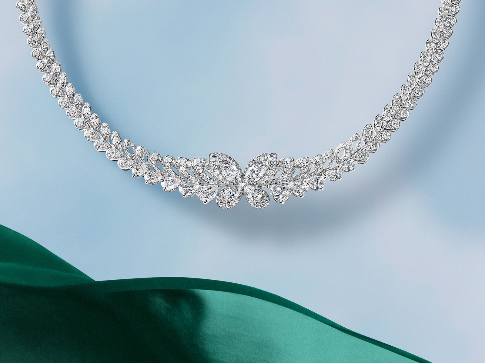 Image shows model wearing Graff Butterfly White Diamond High Jewellery