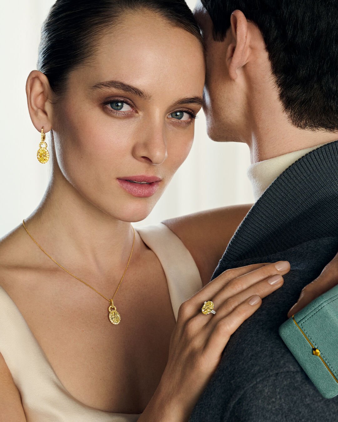 Image shows model wearing Laurence Graff Signature bangles and rings 