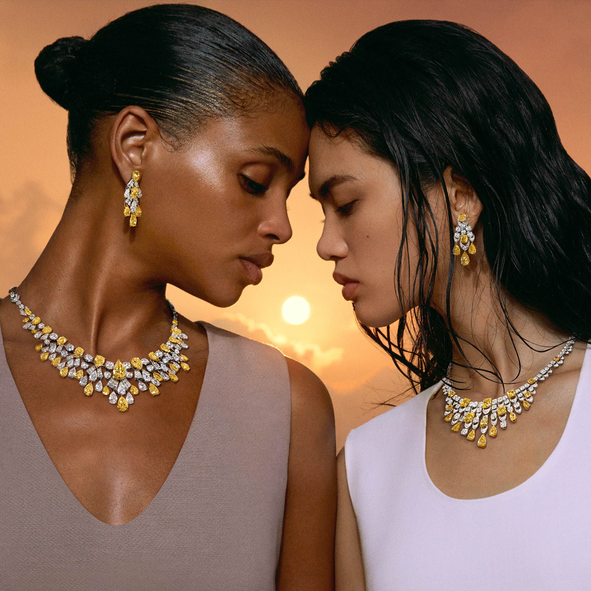 Models wear yellow and white diamond high jewellery