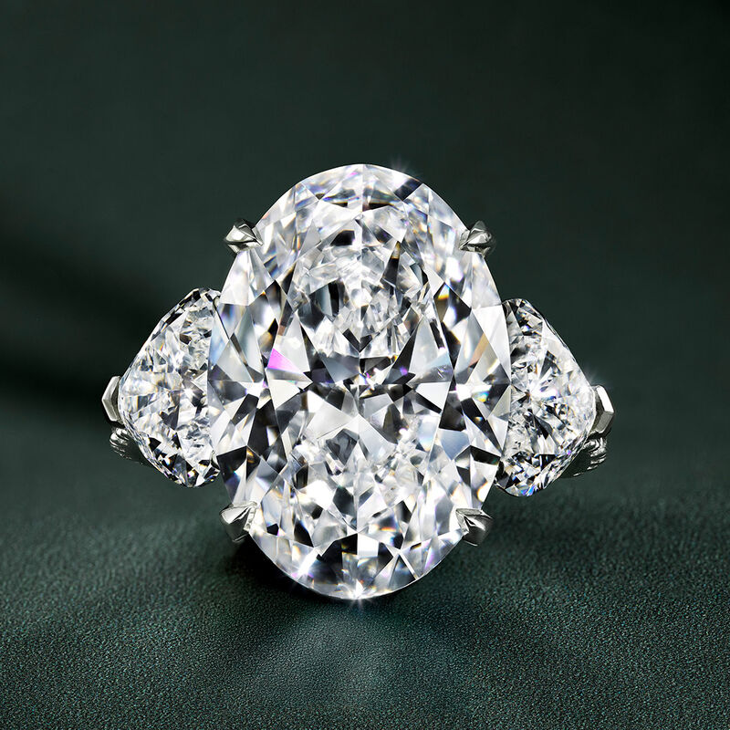 Oval Diamond Solitaire Ring with Heart Shape Diamond Shoulders