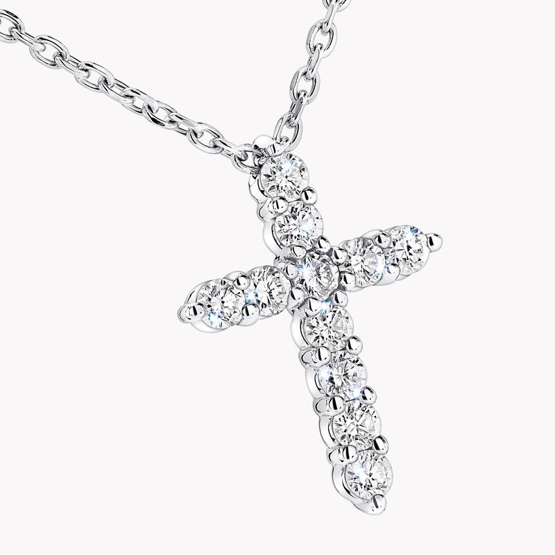 Petit pendentif croix en diamants ronds