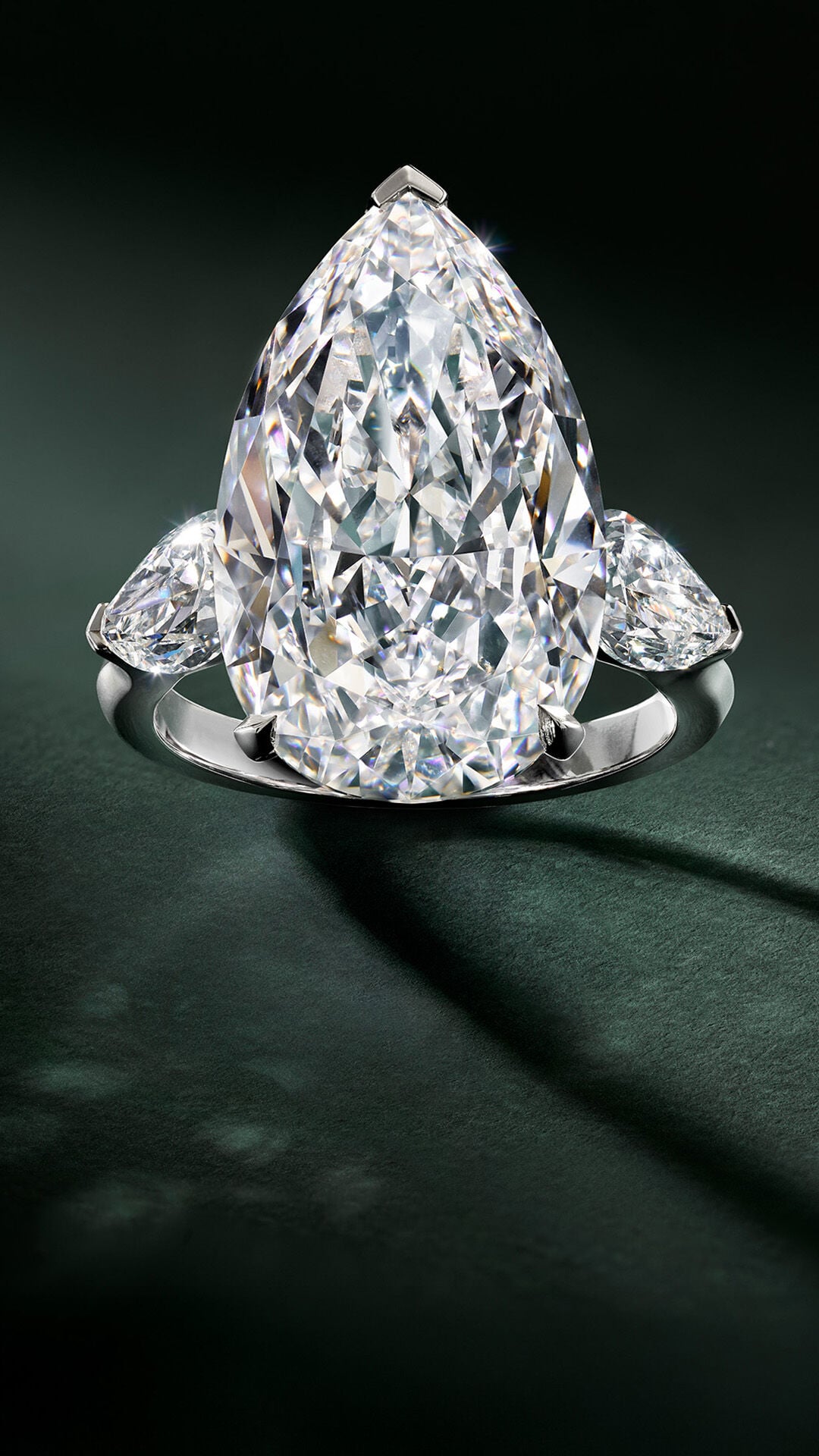 image shows models wearing Graff diamond bridal jewellery