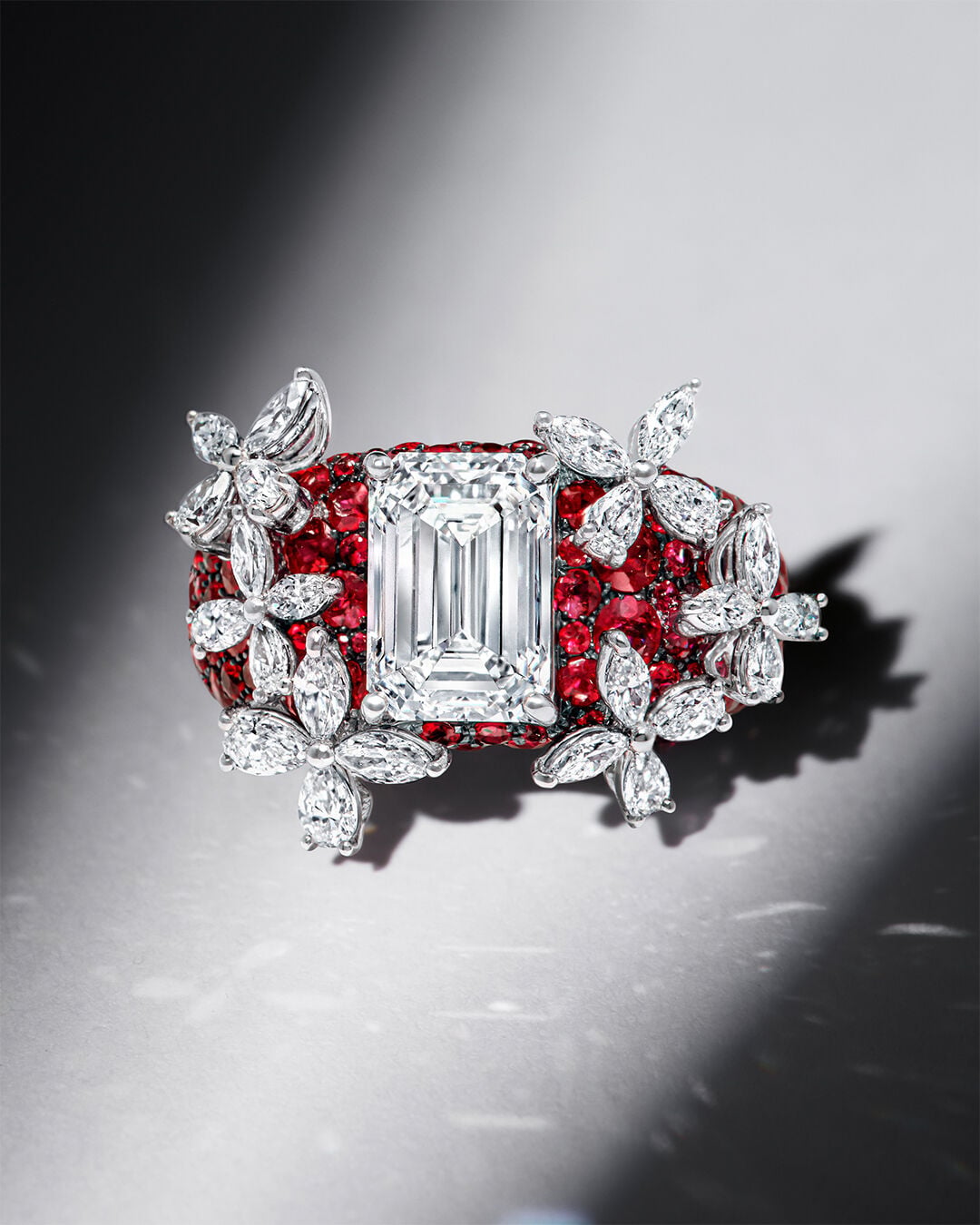 Image shows model wearing Classic Graff Diamond Square Emerald Cut Stud Earring