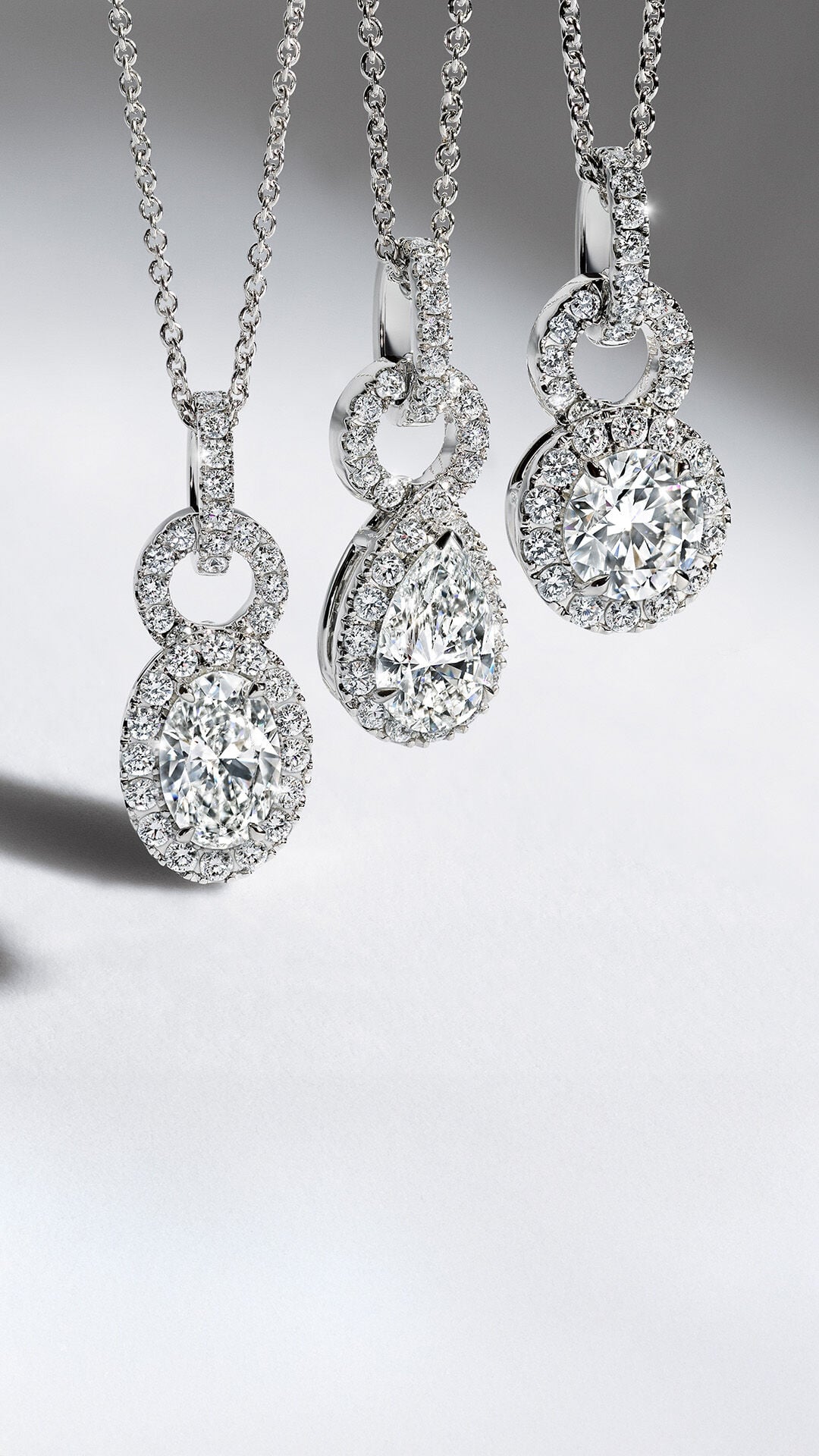 Laurence Graff Signature - image shows models wearing Laurence Graff Signature collection jewellery