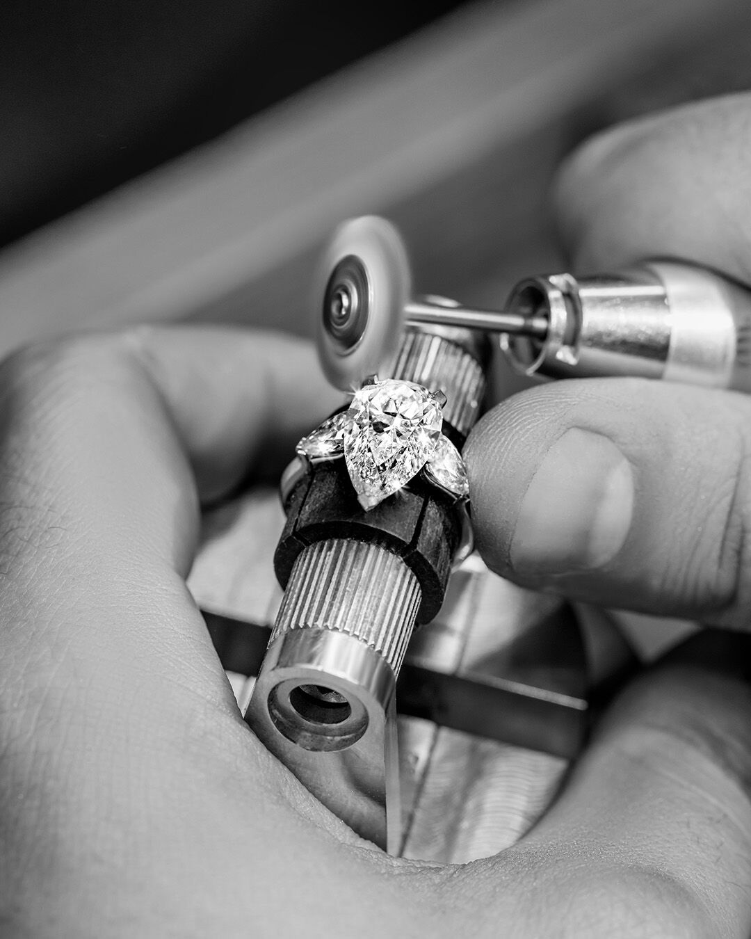 Image shows creation of Graff Pear Shape Promise diamond engagement ring in Graff workshop