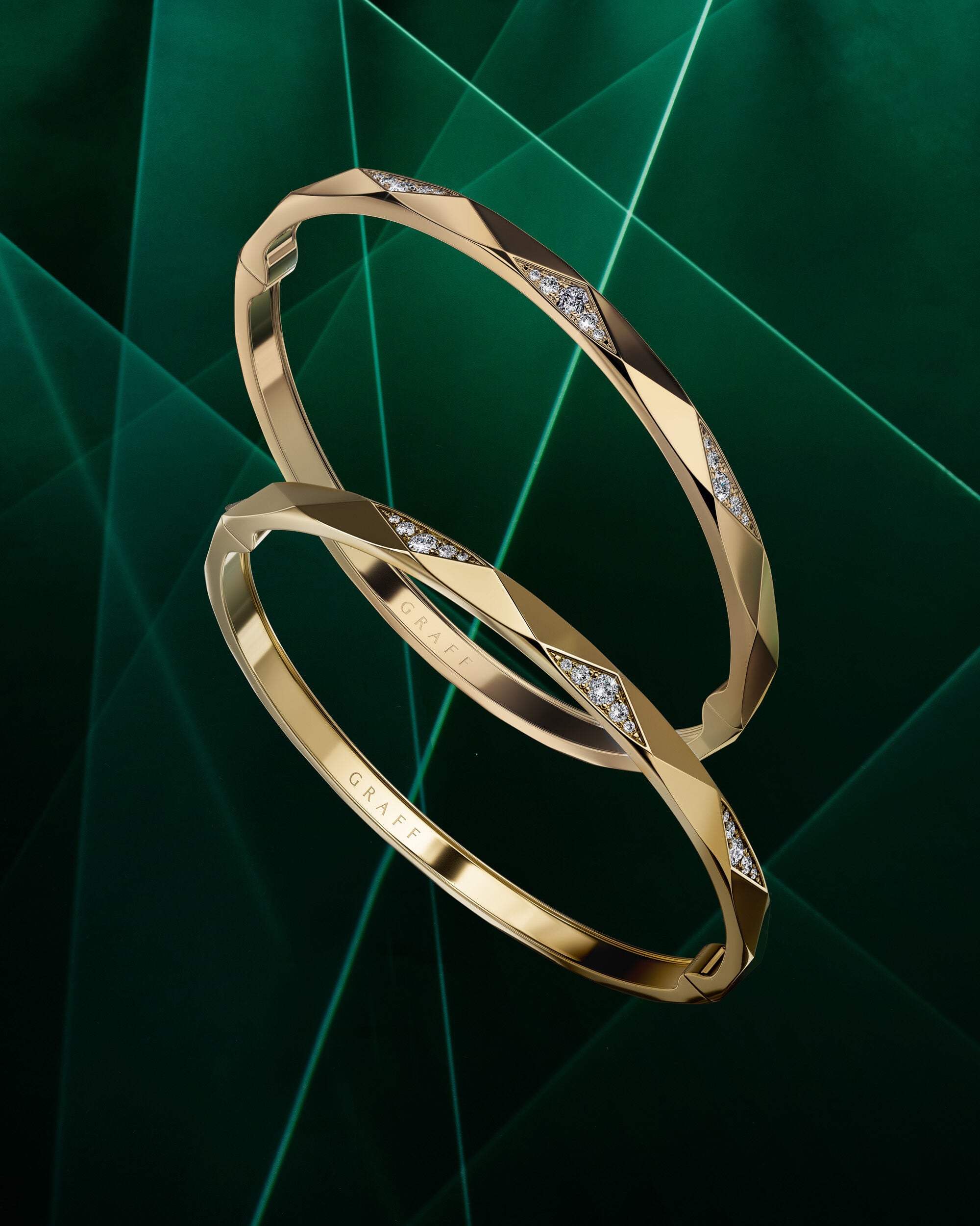 Image shows model wearing Laurence Graff Signature rings and bangles