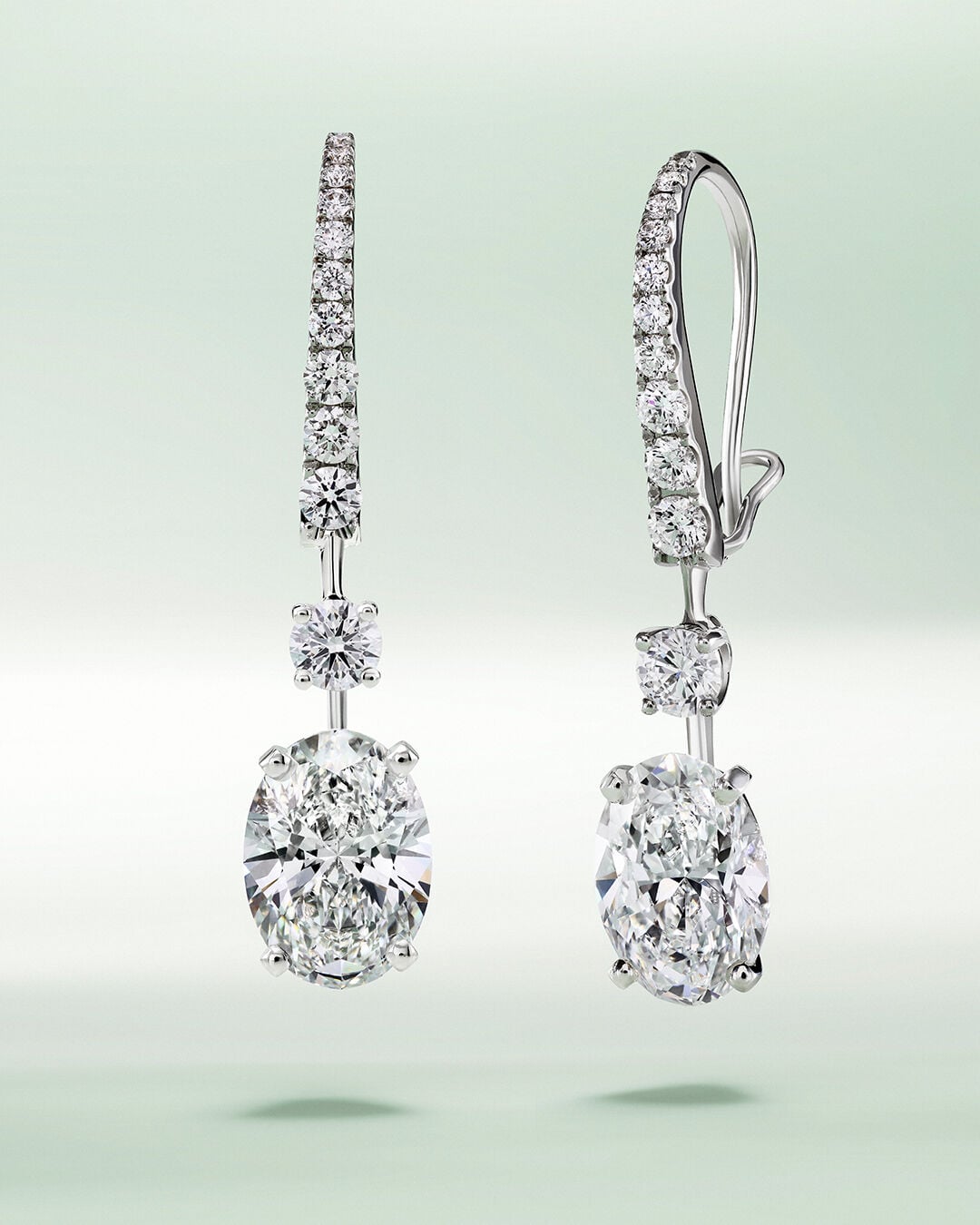Image shows Graff Oval cut diamond drop earrings