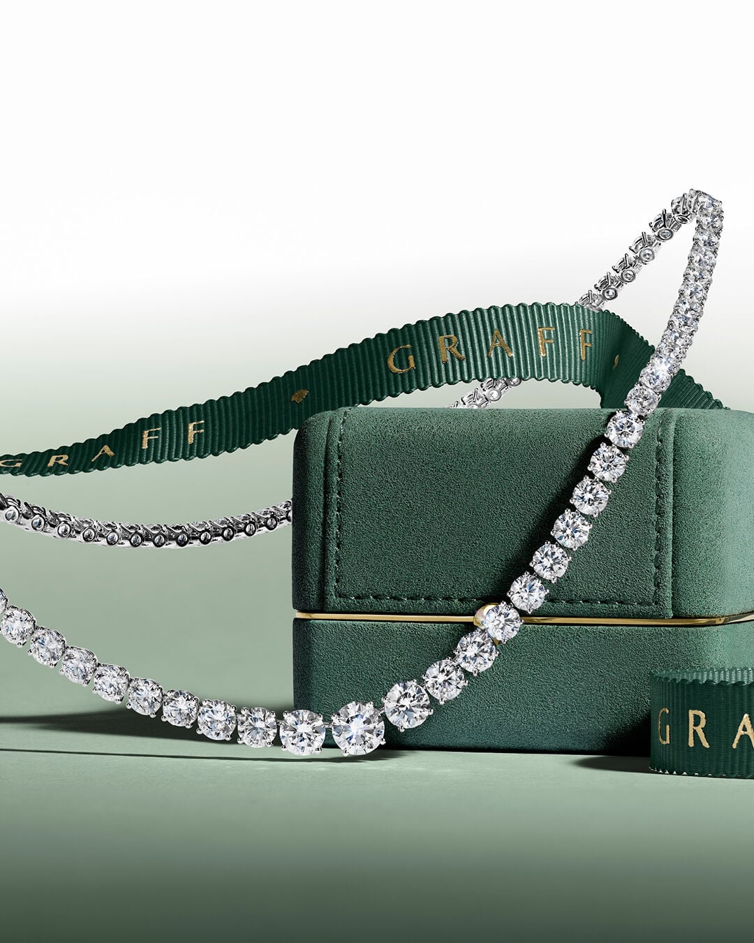Image shows Graff Round Diamond necklace and Graff box and ribbon