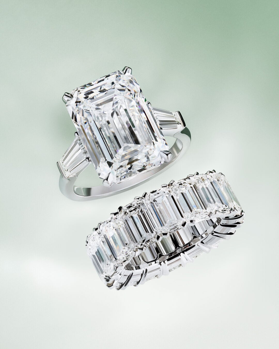 Image shows Graff Emerald Cut diamond engagement ring and diamond eternity band